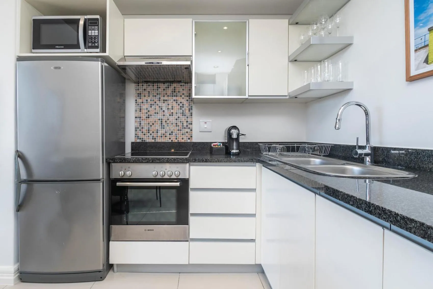 Kitchen or kitchenette in Xenia Aparthotel by Totalstay