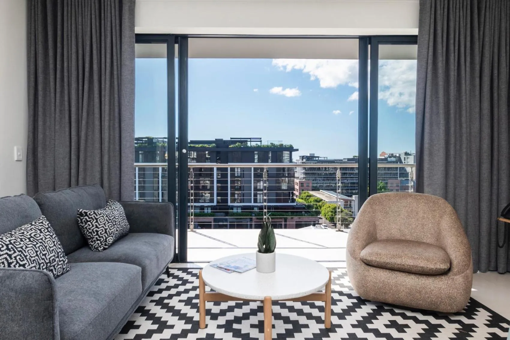 Living room in Xenia Aparthotel by Totalstay