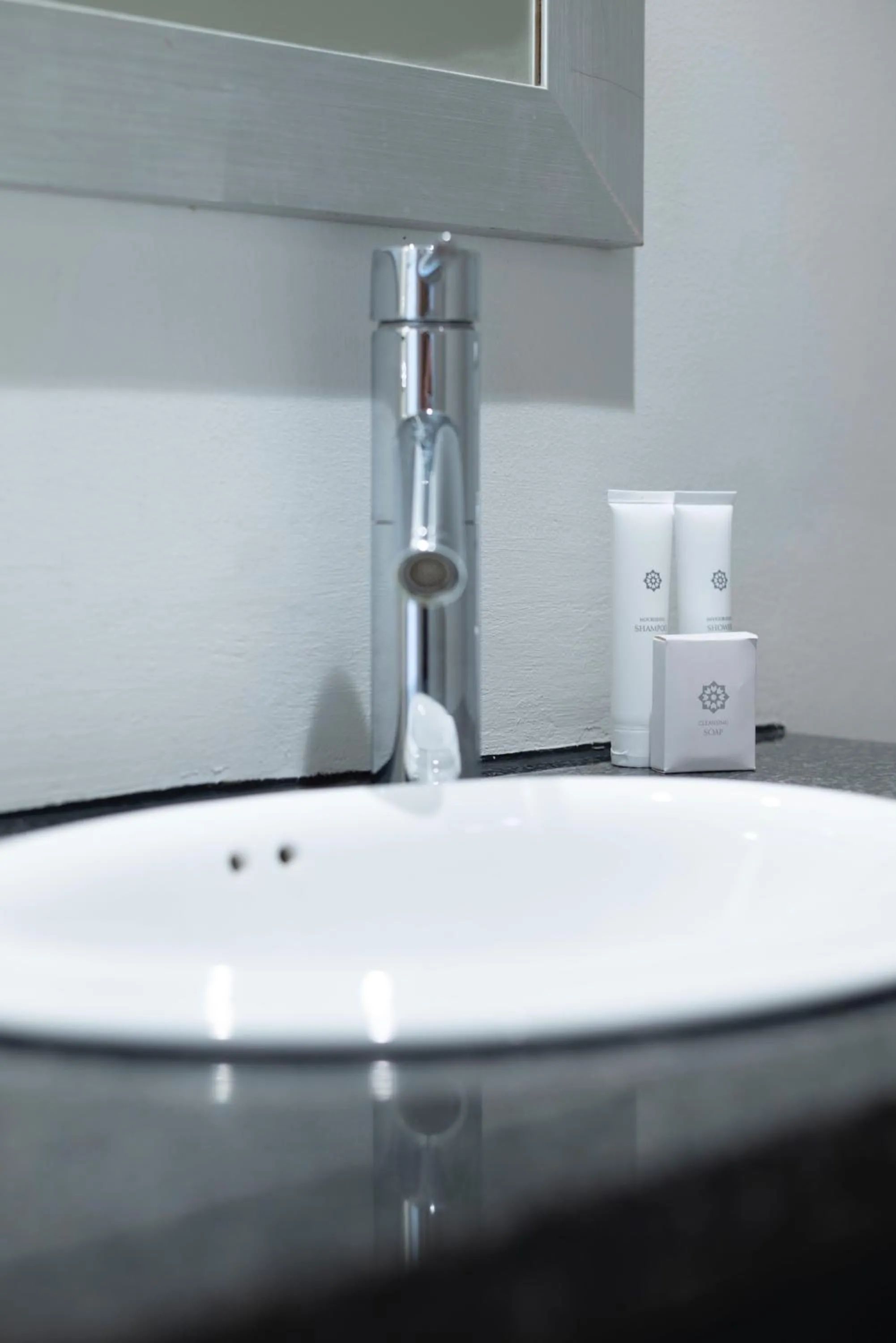 Bathroom in Xenia Aparthotel by Totalstay