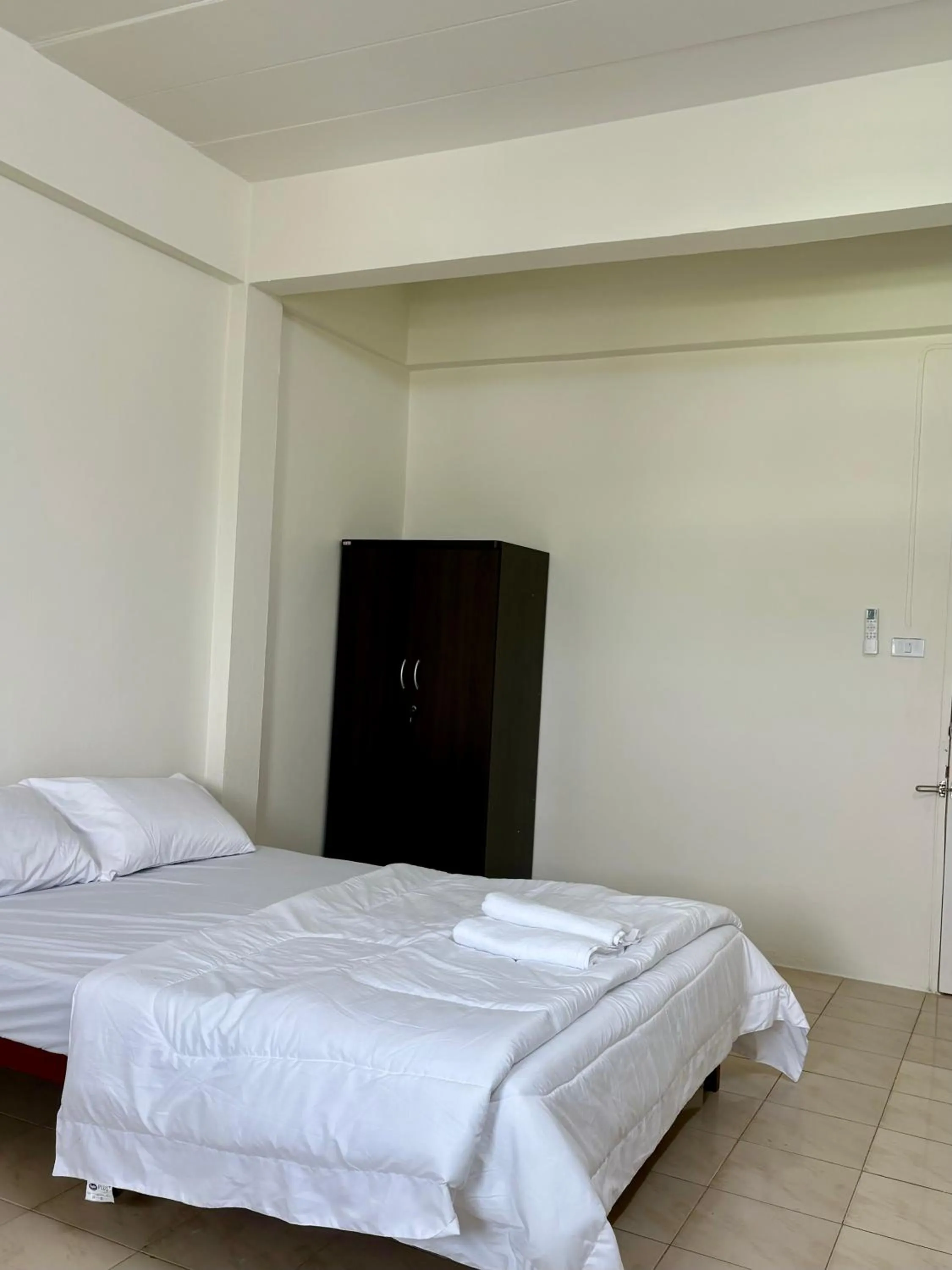 Bed in Suppamas Mansion ศุภมาส แมนชั่น