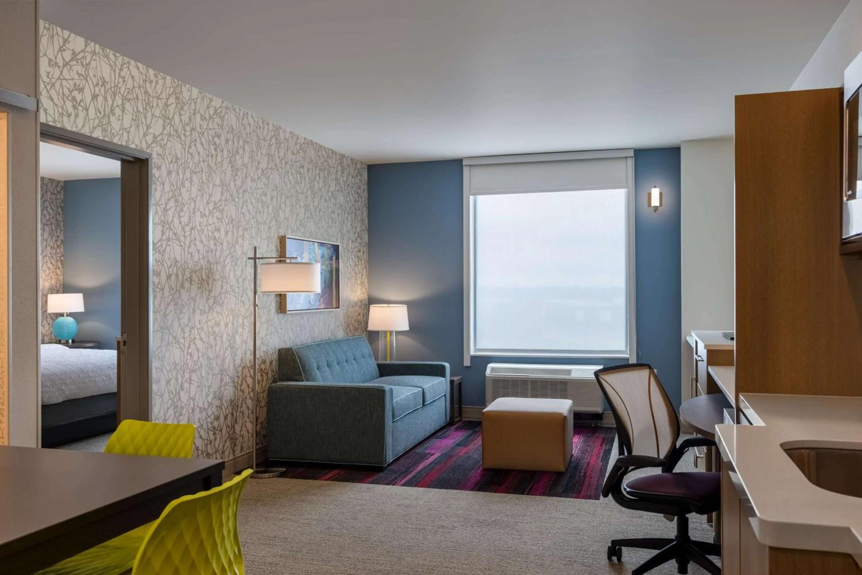 Living room, Bed in Home2 Suites By Hilton Ankeny