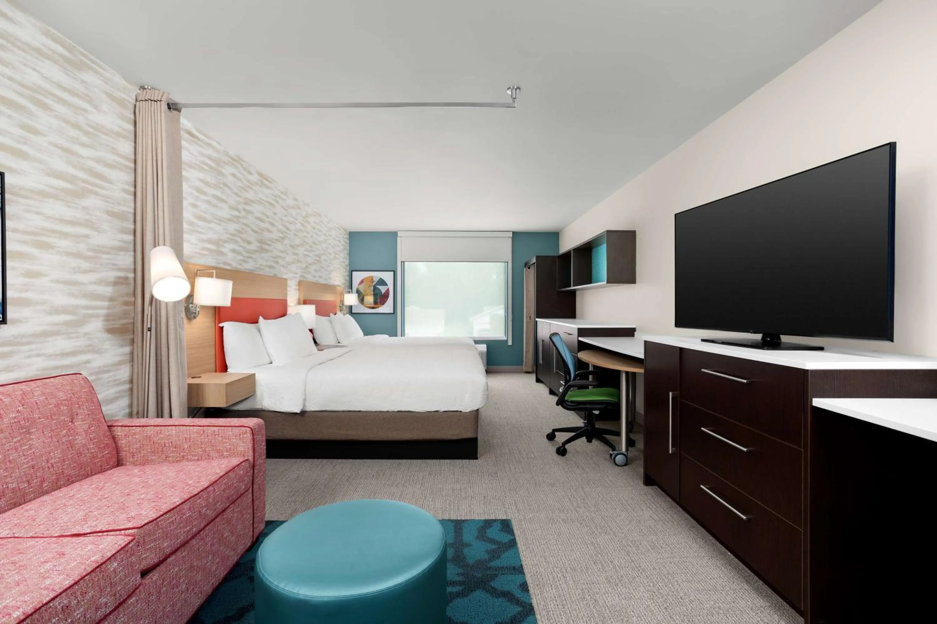 Living room, Bed in Home2 Suites By Hilton Owatonna