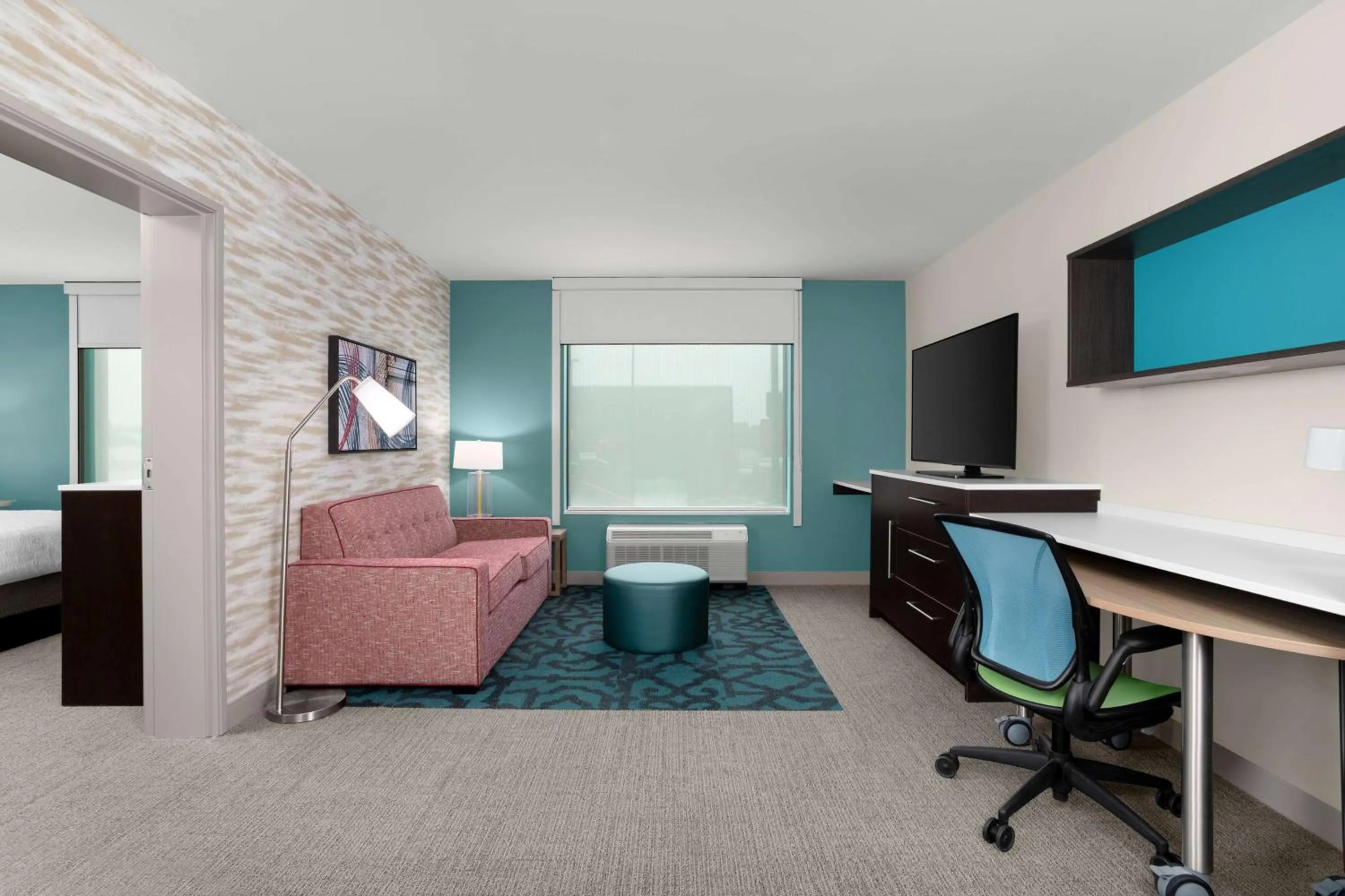 Living room, Bed in Home2 Suites By Hilton Owatonna