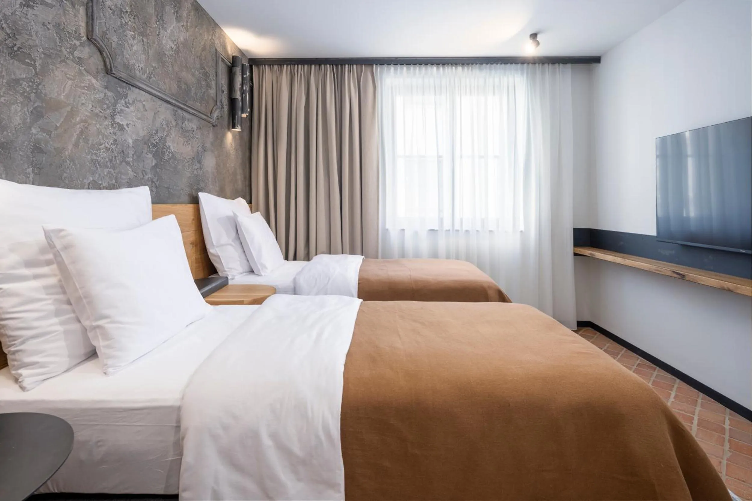 Bed in Nomadic Urban Premium Suites