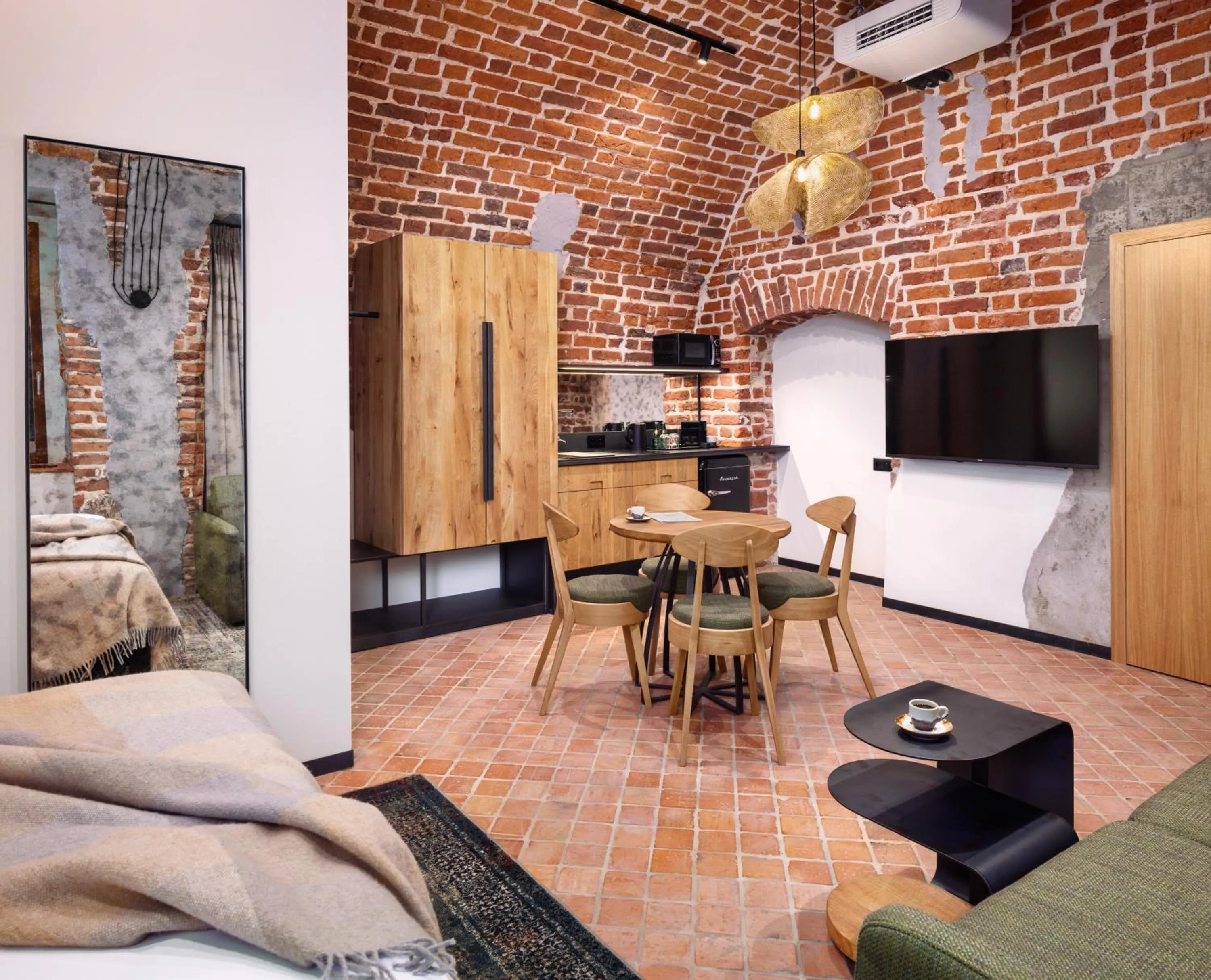 Communal lounge/ TV room in Nomadic Urban Premium Suites