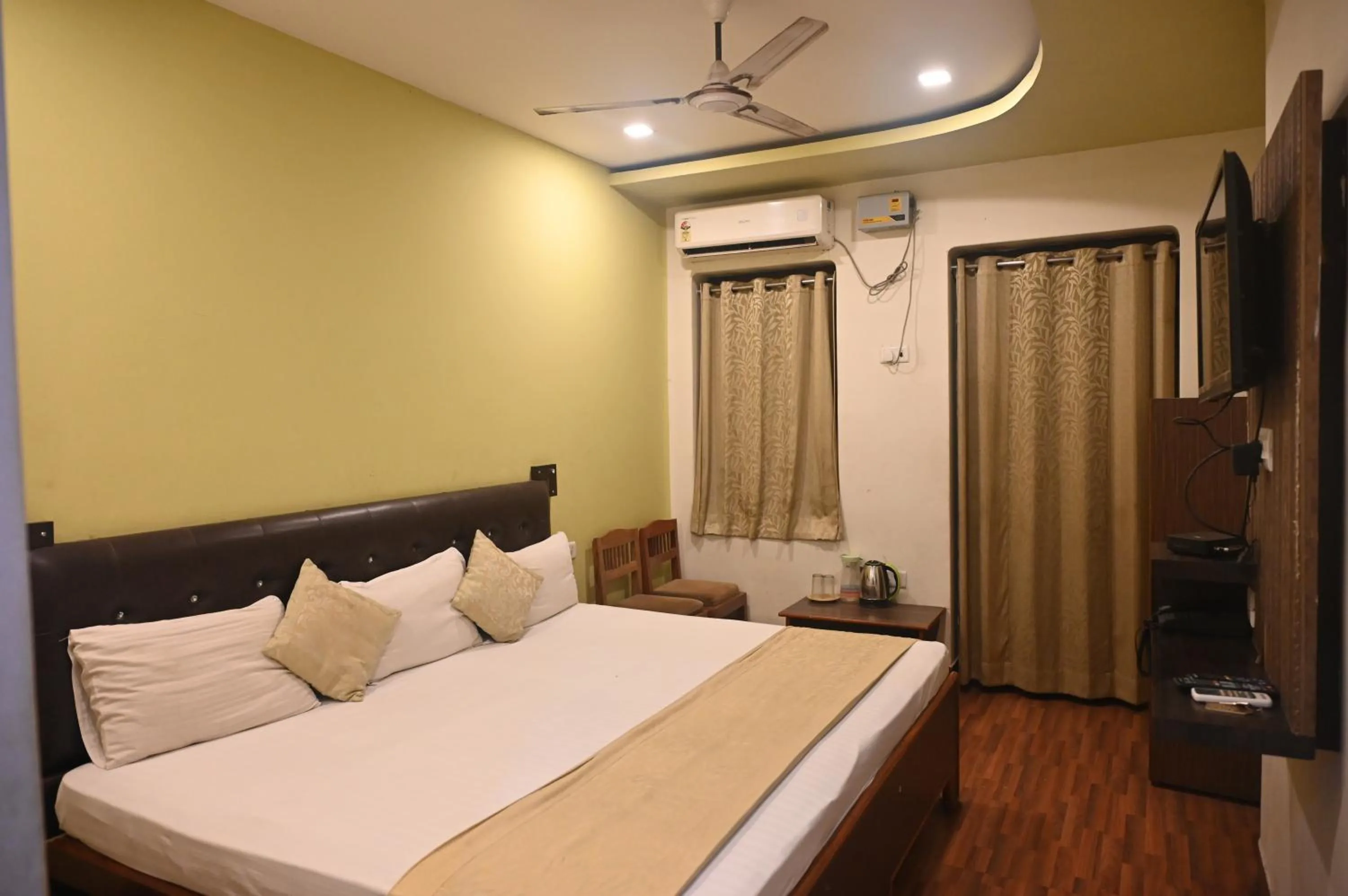 Bed in Hotel Gokul Grand