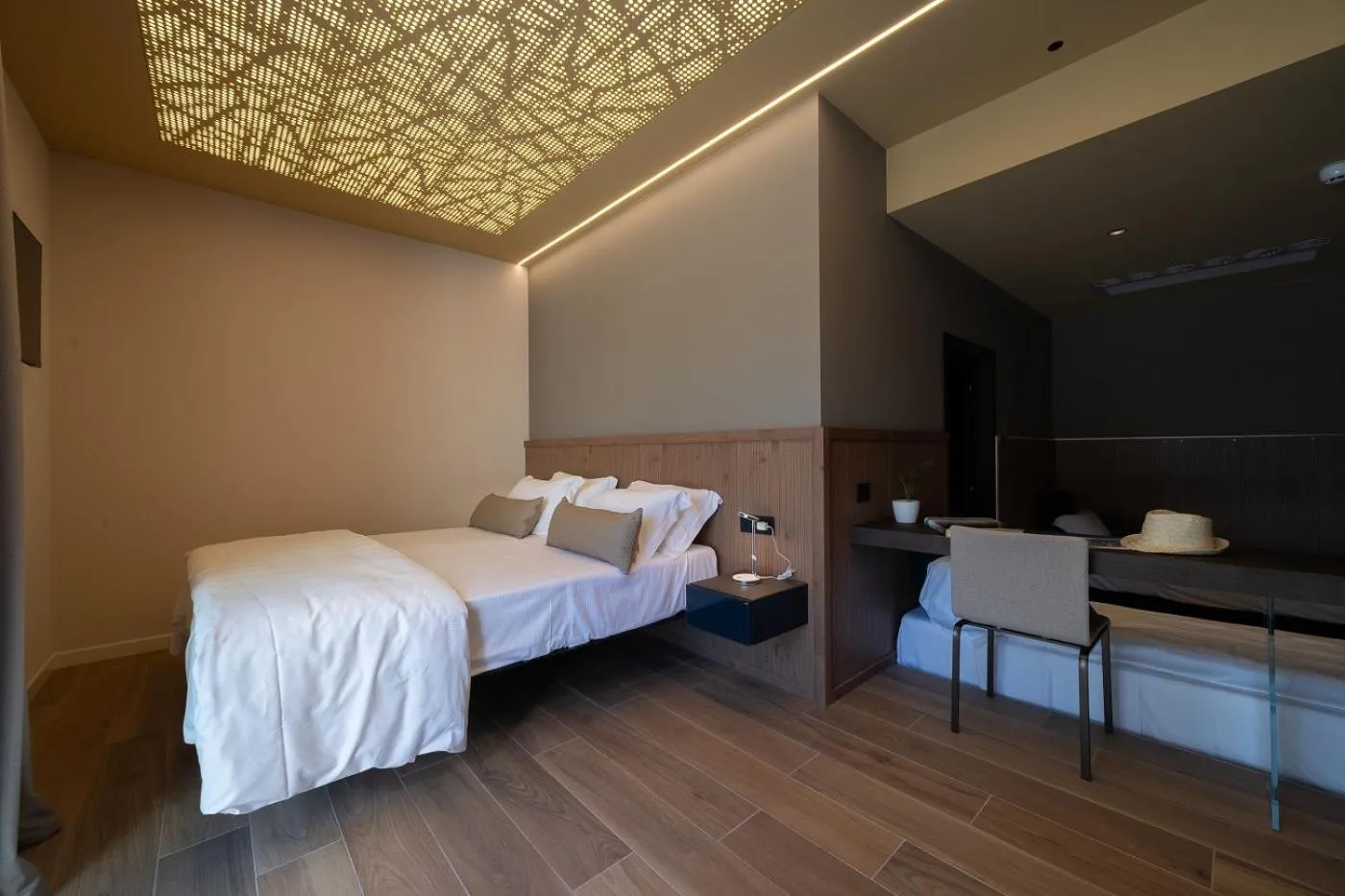 Bed in Il Tridente Hotel