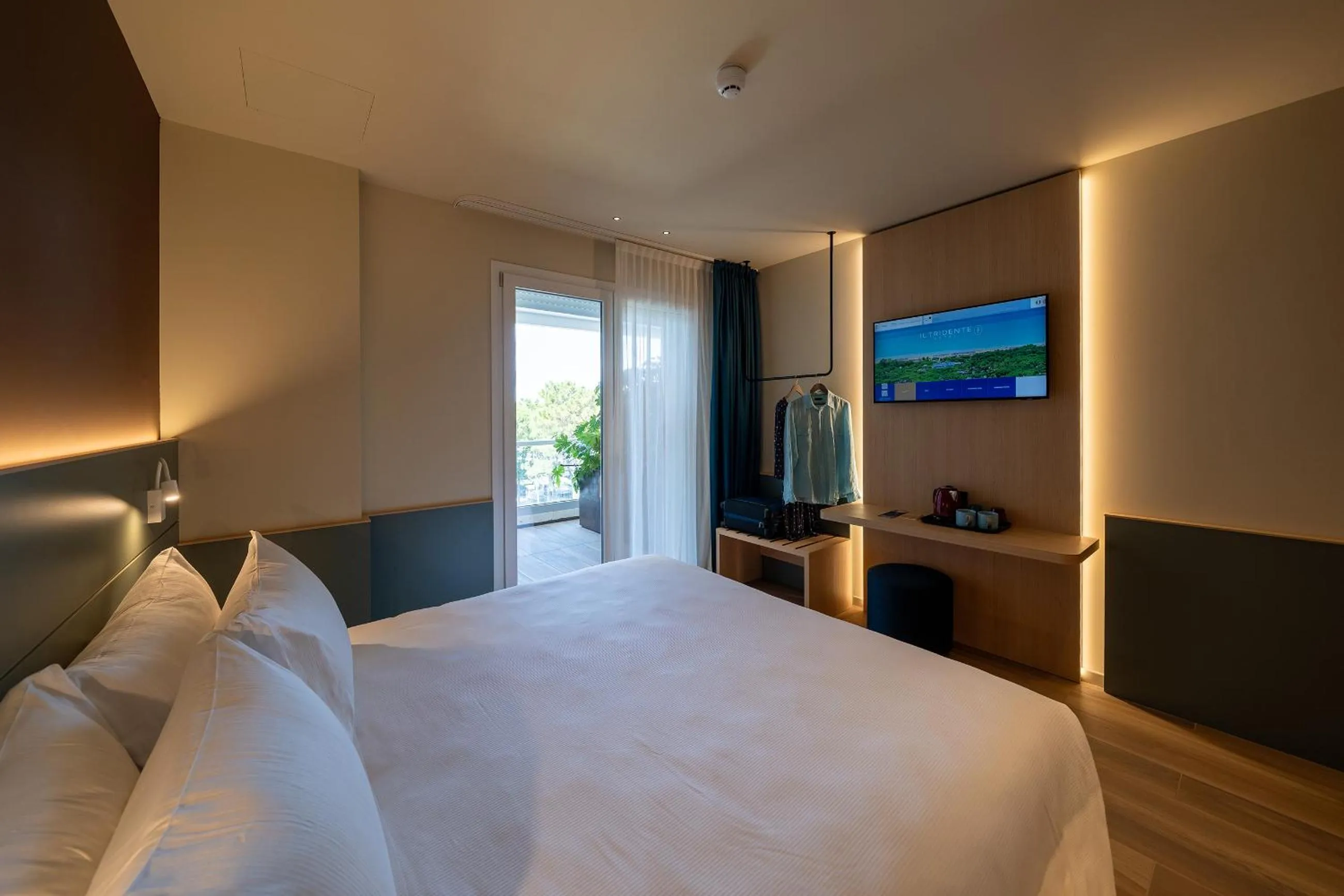 Bed in Il Tridente Hotel