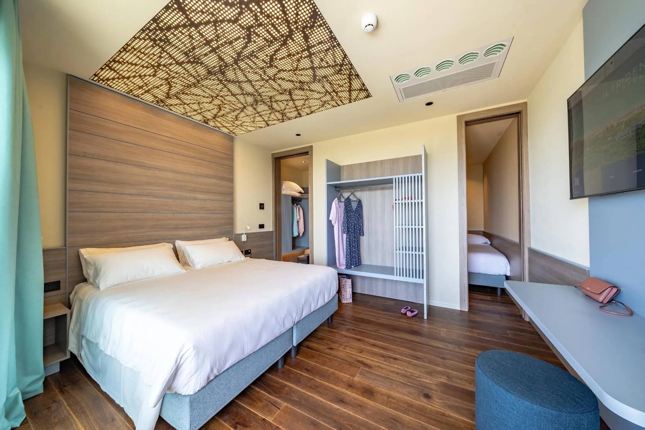 Bed in Il Tridente Hotel