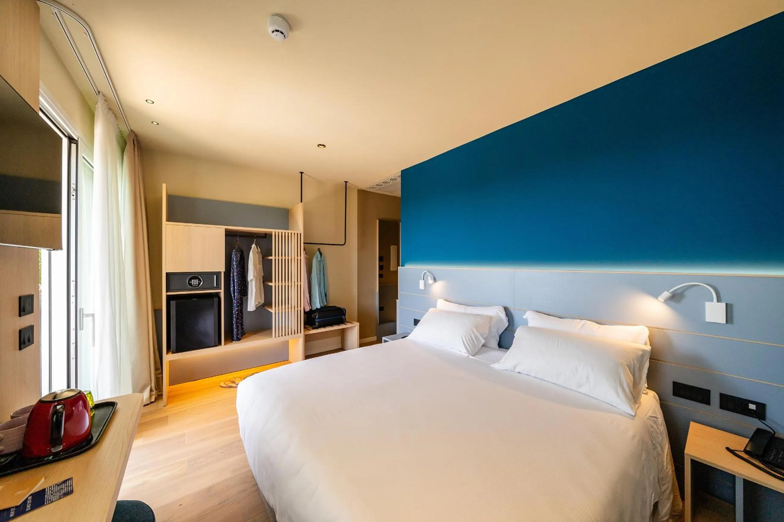 Bed in Il Tridente Hotel