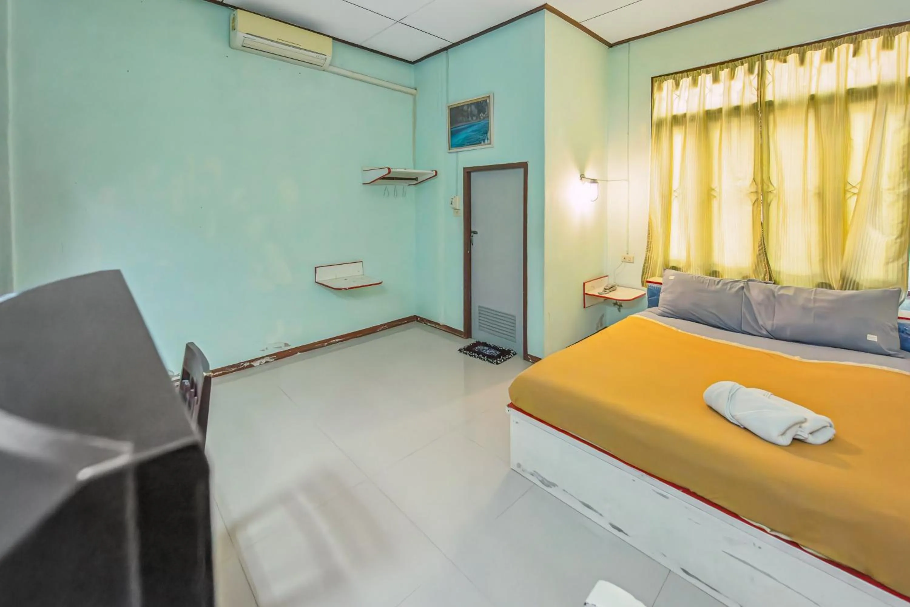 Bed in The Prince Hotel