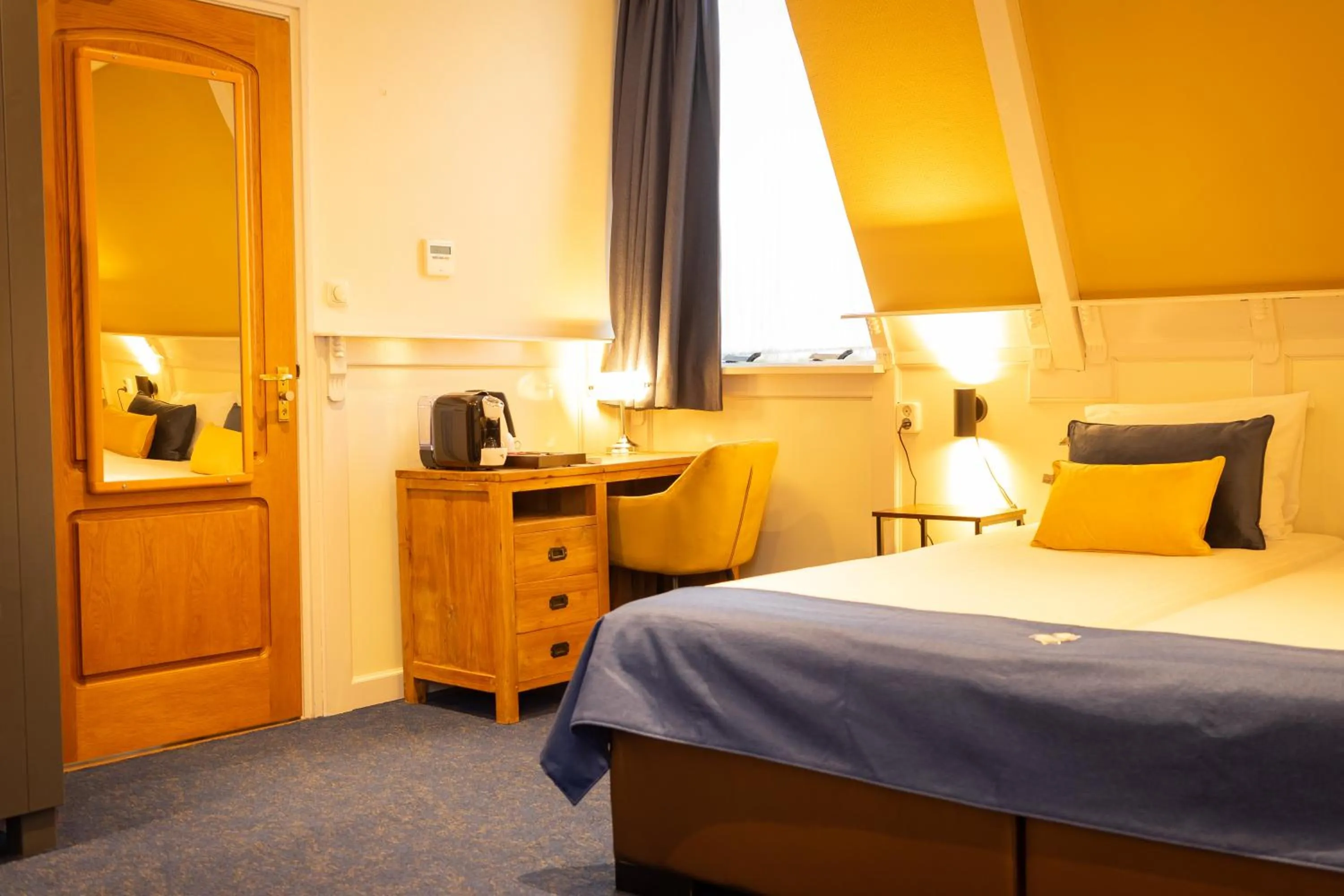 Bed in Hotel de Gulden Leeuw