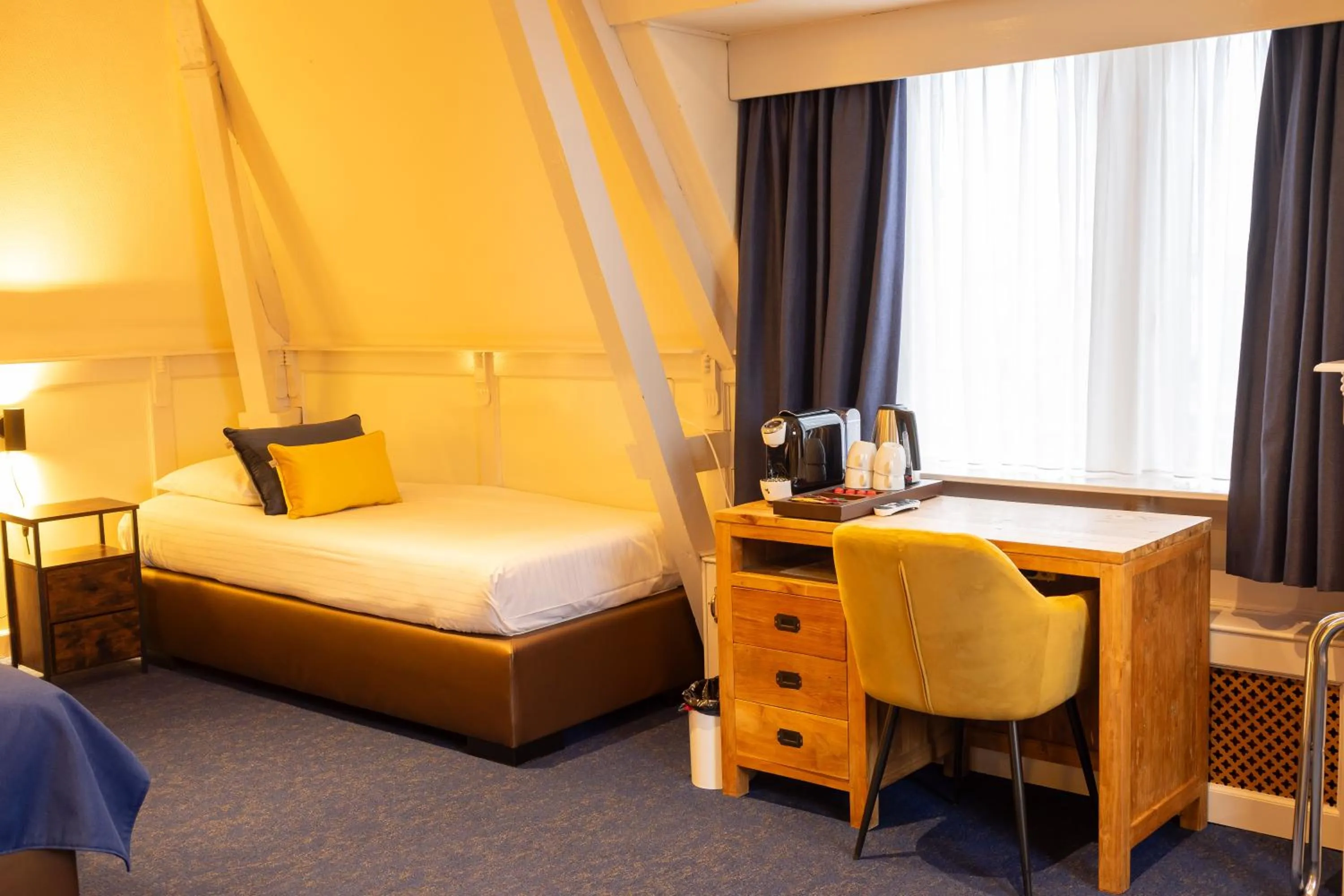 Bed in Hotel de Gulden Leeuw