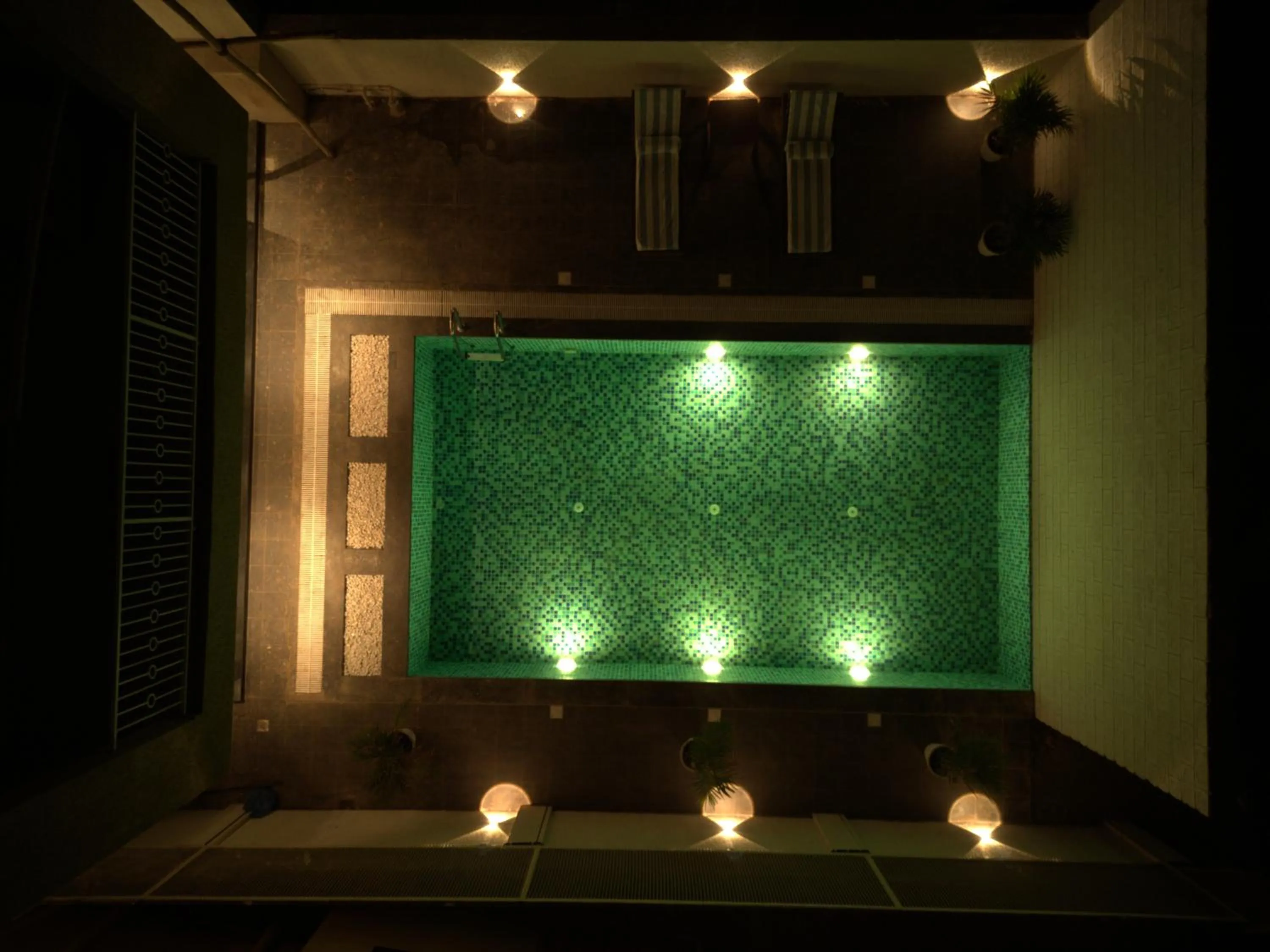 Swimming pool in Bedzzz Xclusiv Morjim, Goa By Leisure Hotels