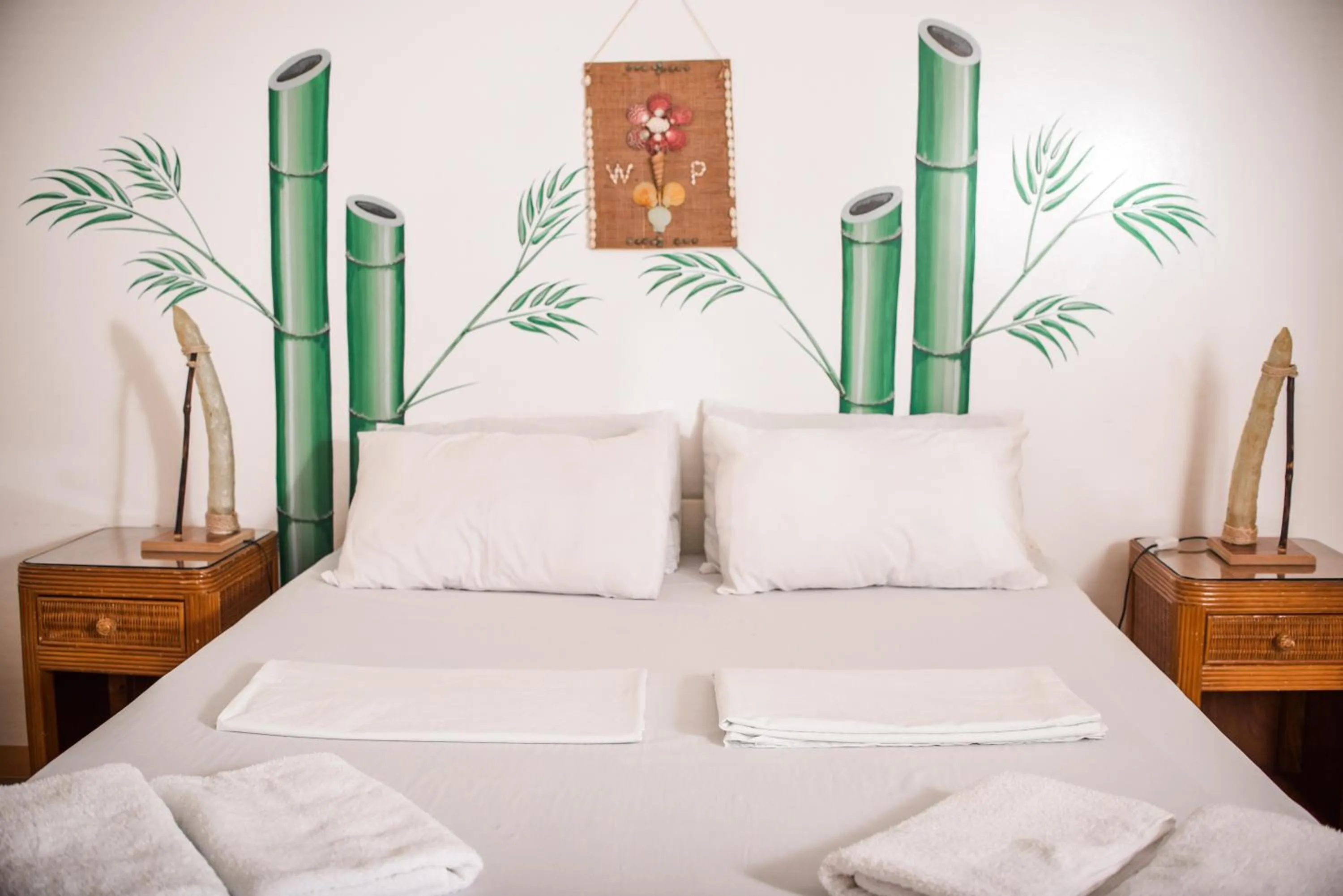 Bed in Whispering Palms Island Resort