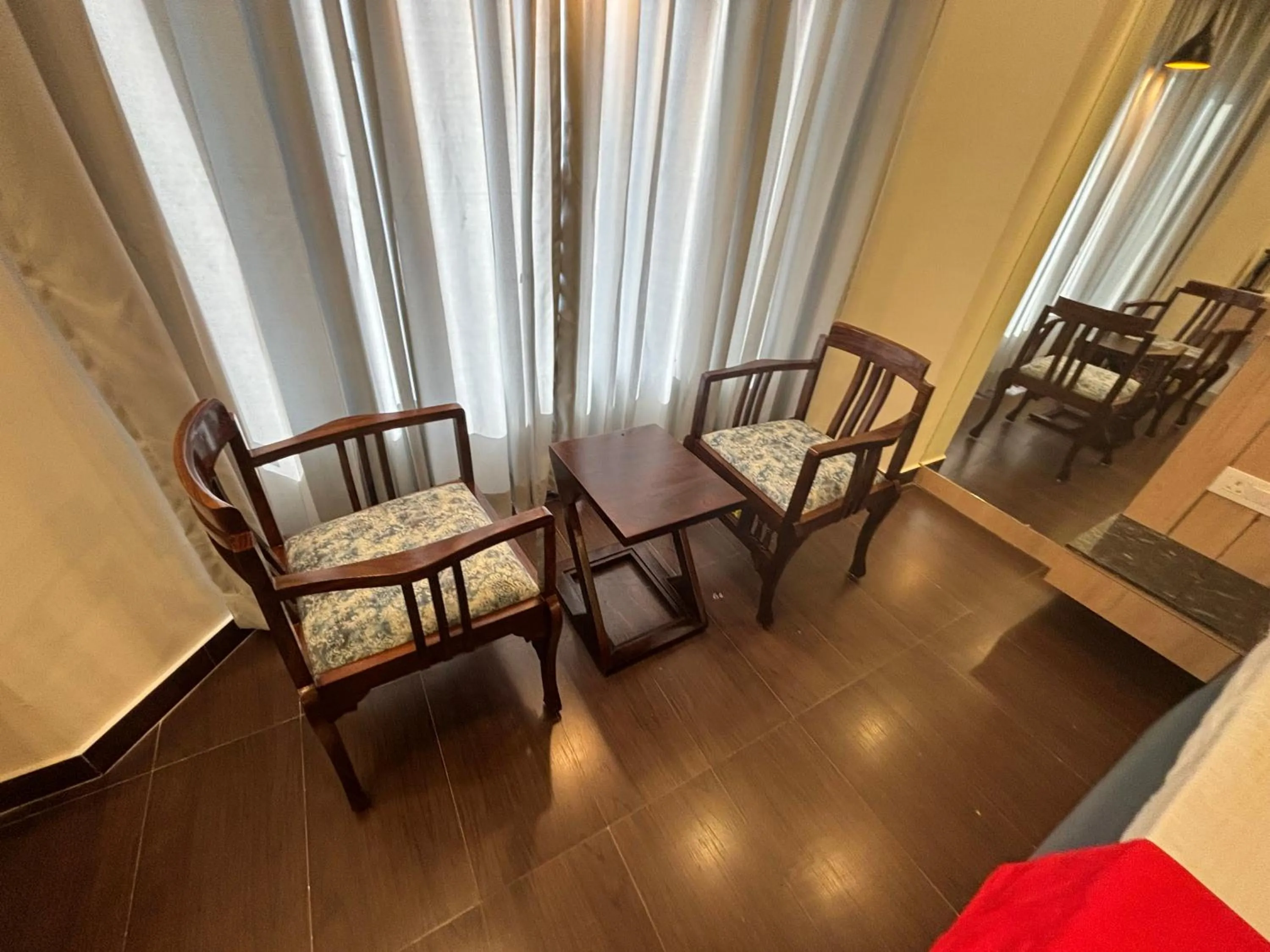 Seating area, Bed in Hotel Maya international