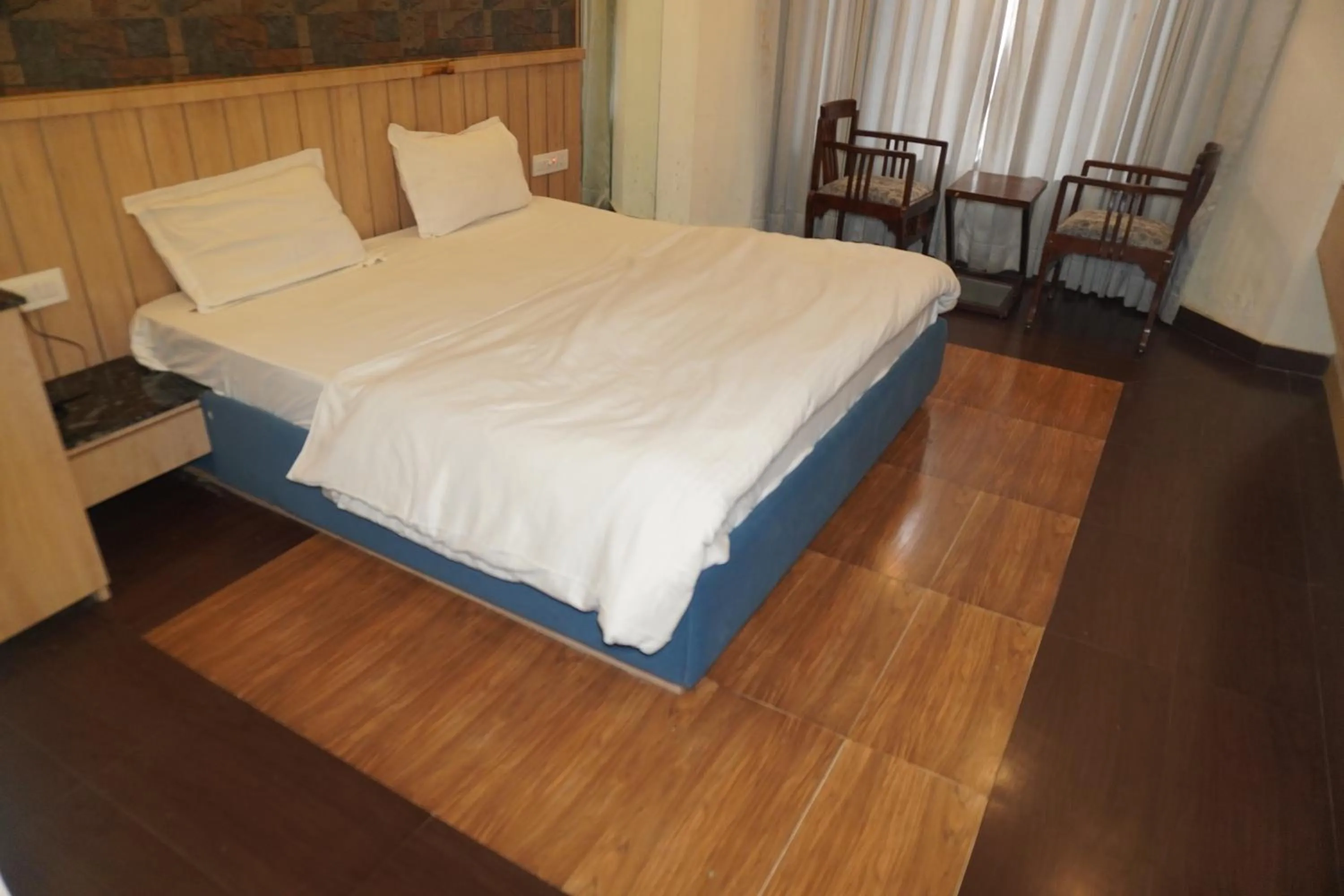 Bed in Hotel Maya international