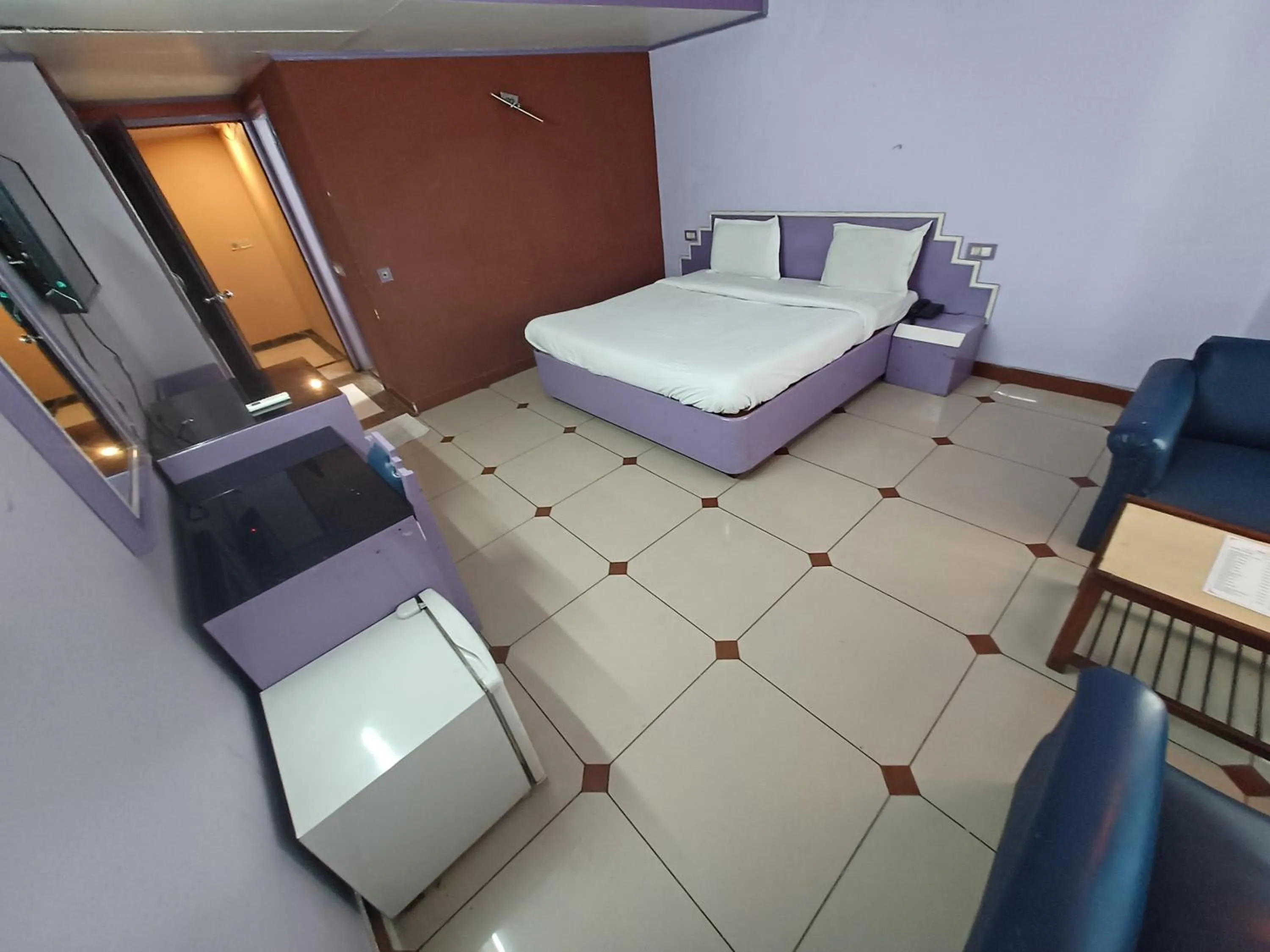 Bed in Hotel Maya international