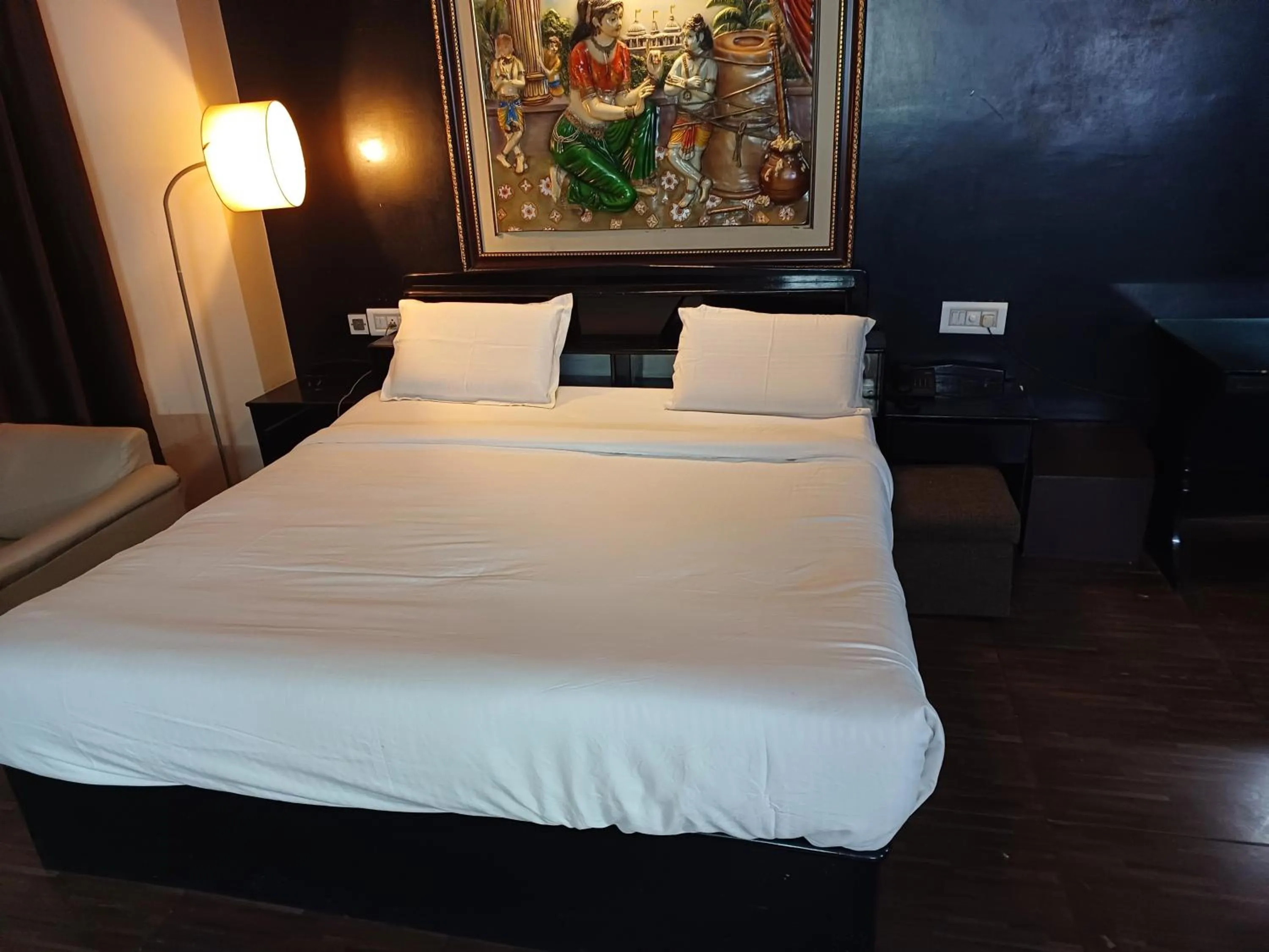 Bed in Hotel Maya international