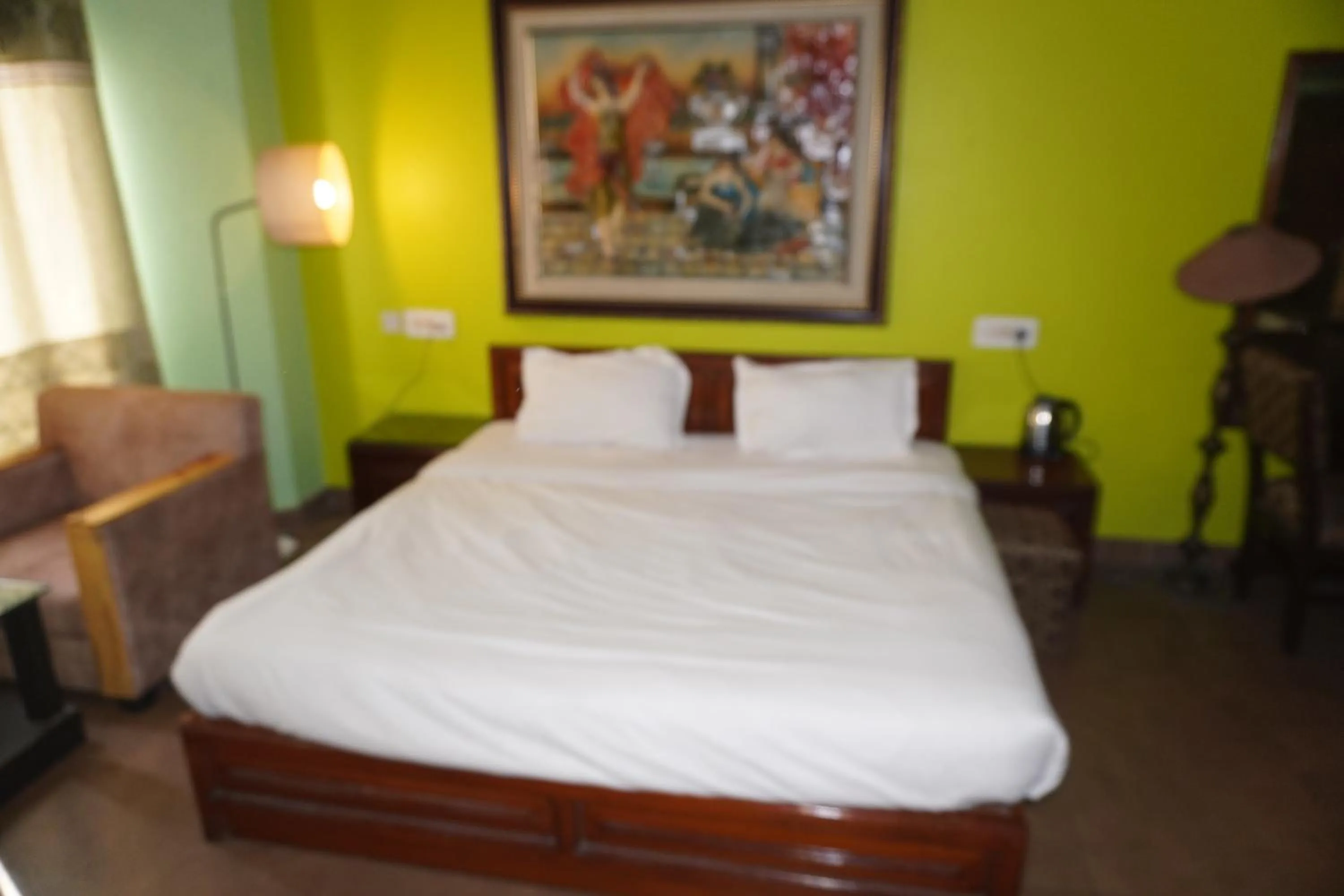 Bed in Hotel Maya international