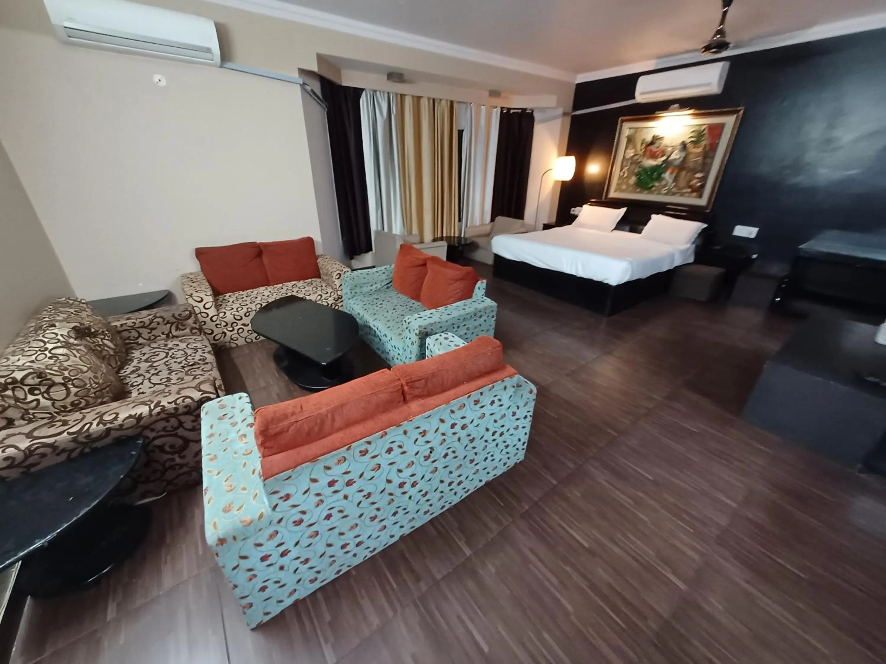 Bed in Hotel Maya international