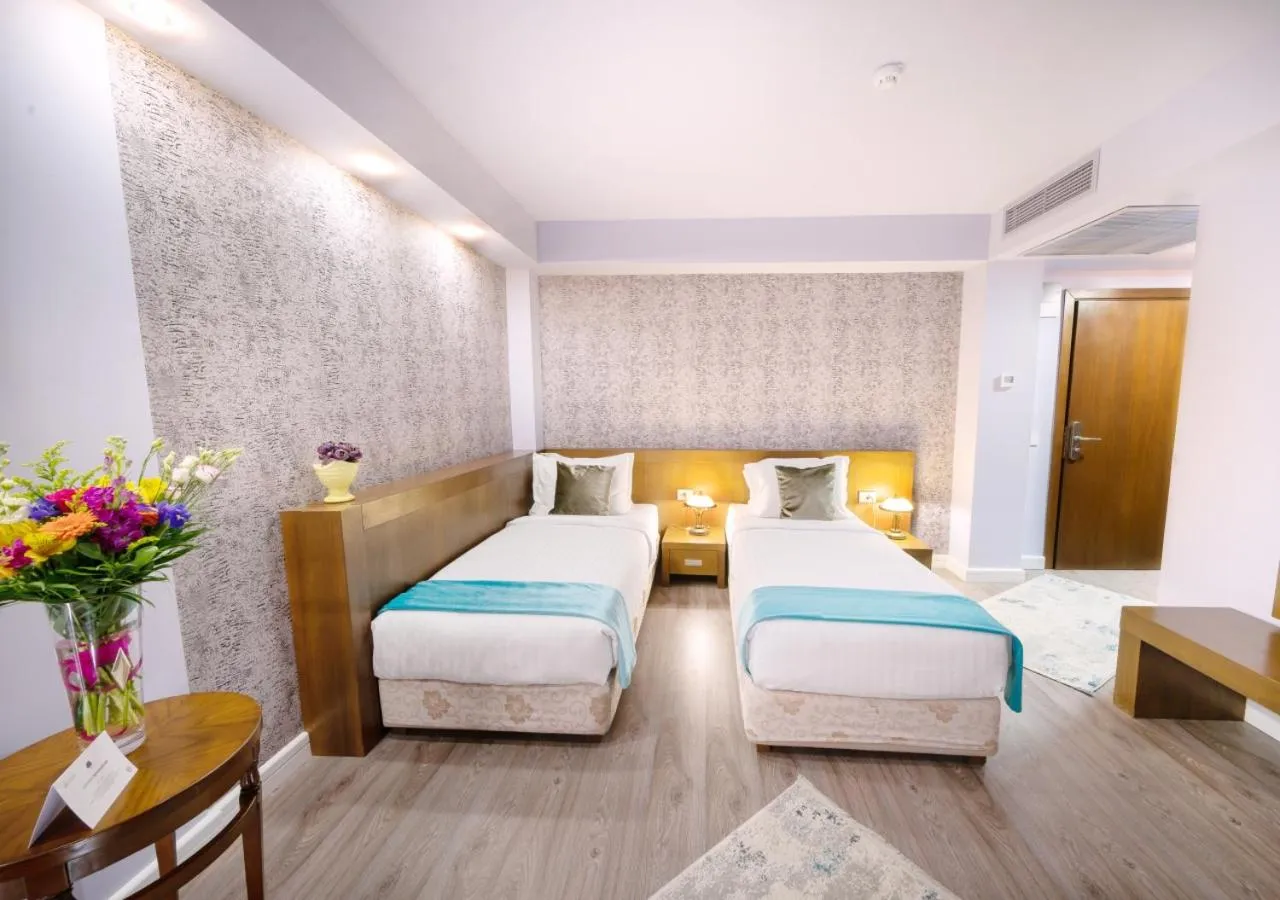 Bed in Phoenicia Comfort Hotel