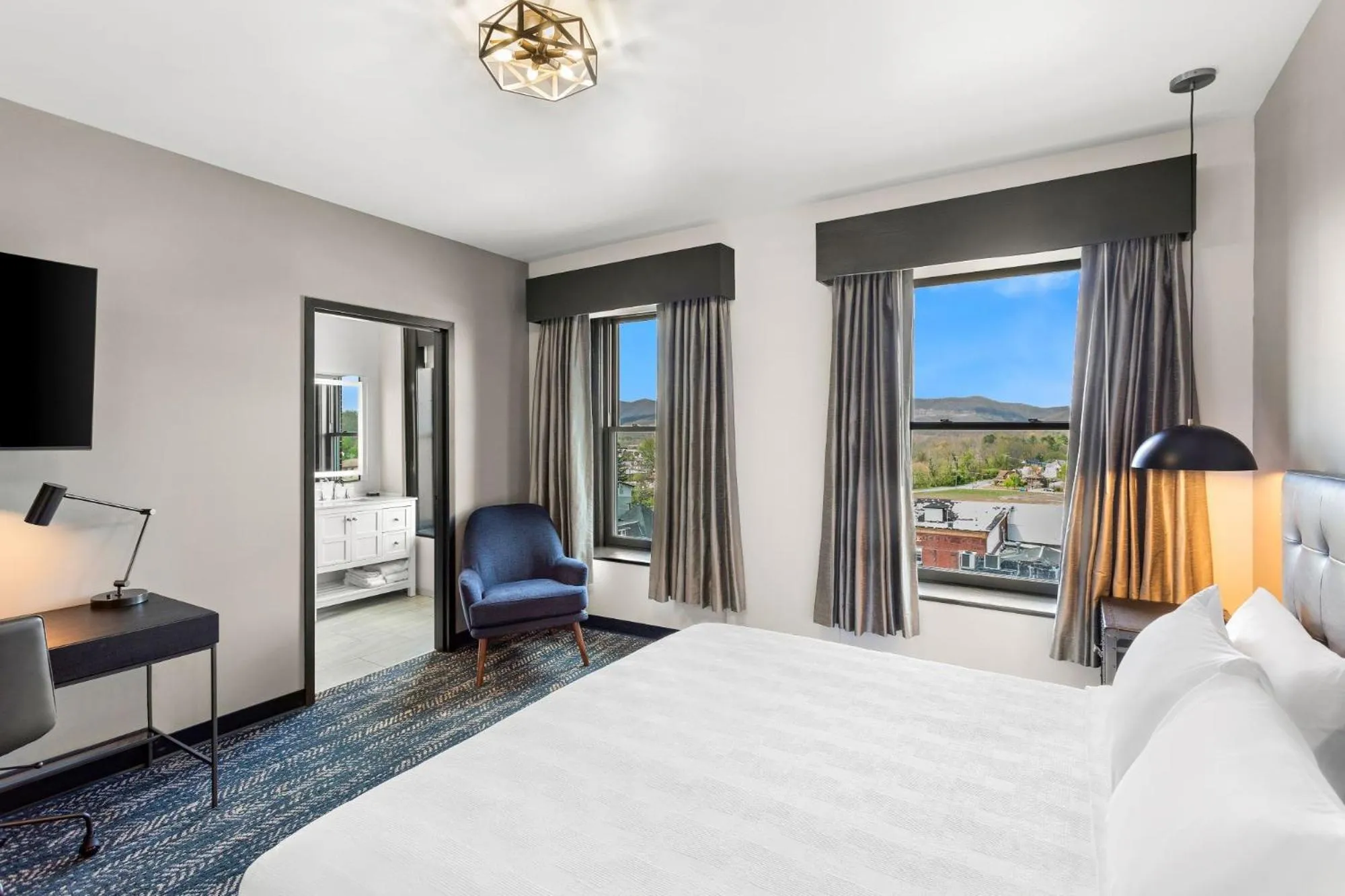 Bed in Tygart Hotel, an Ascend Collection Hotel