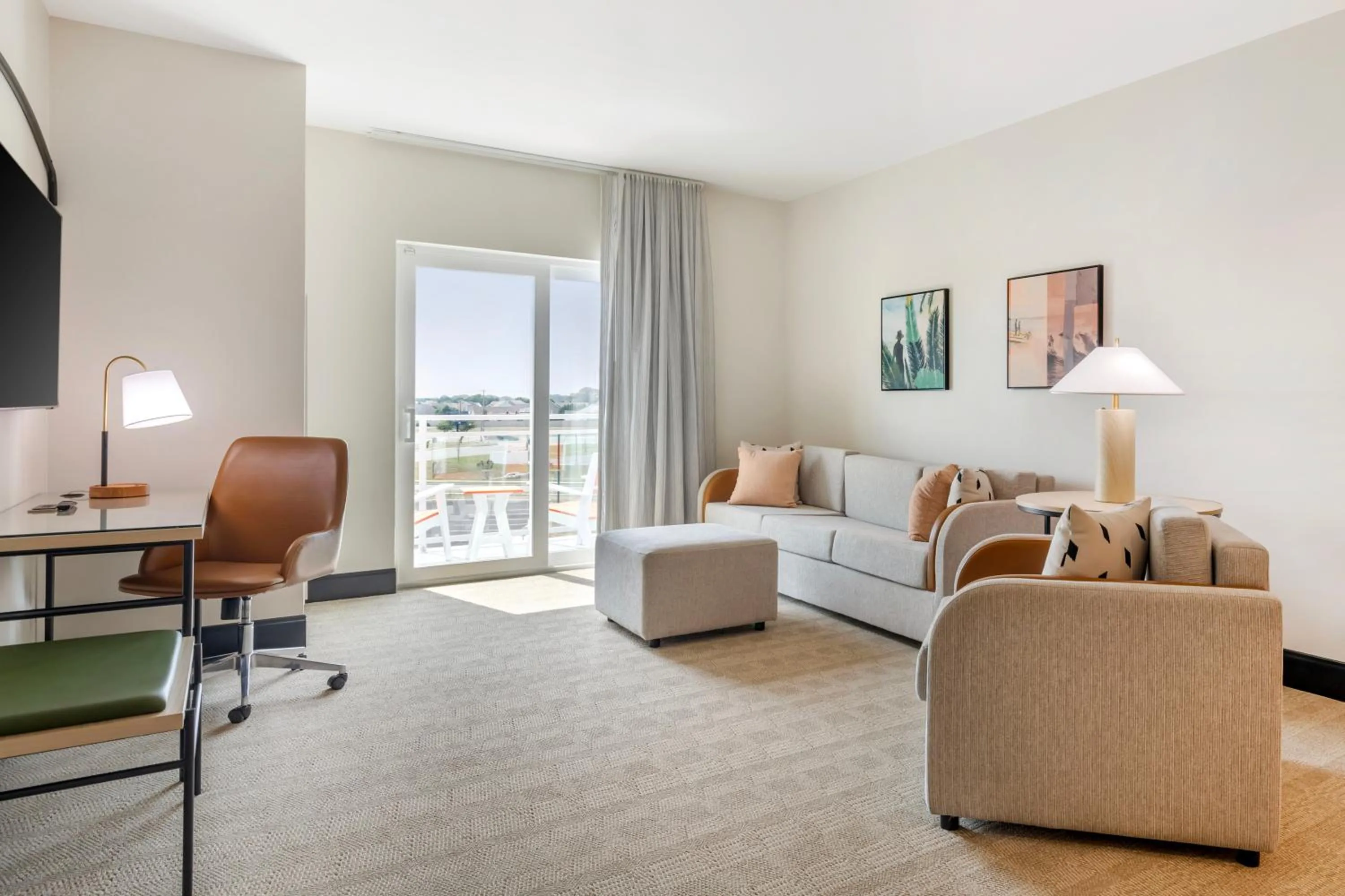 Living room in Cambria Hotel Rehoboth Beach