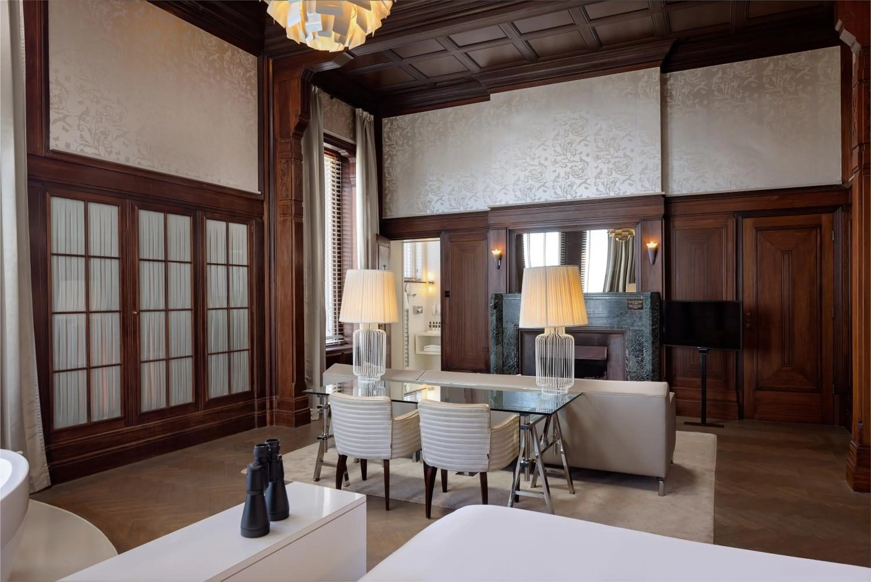 Seating area, Bed in Hotel New York by WestCord