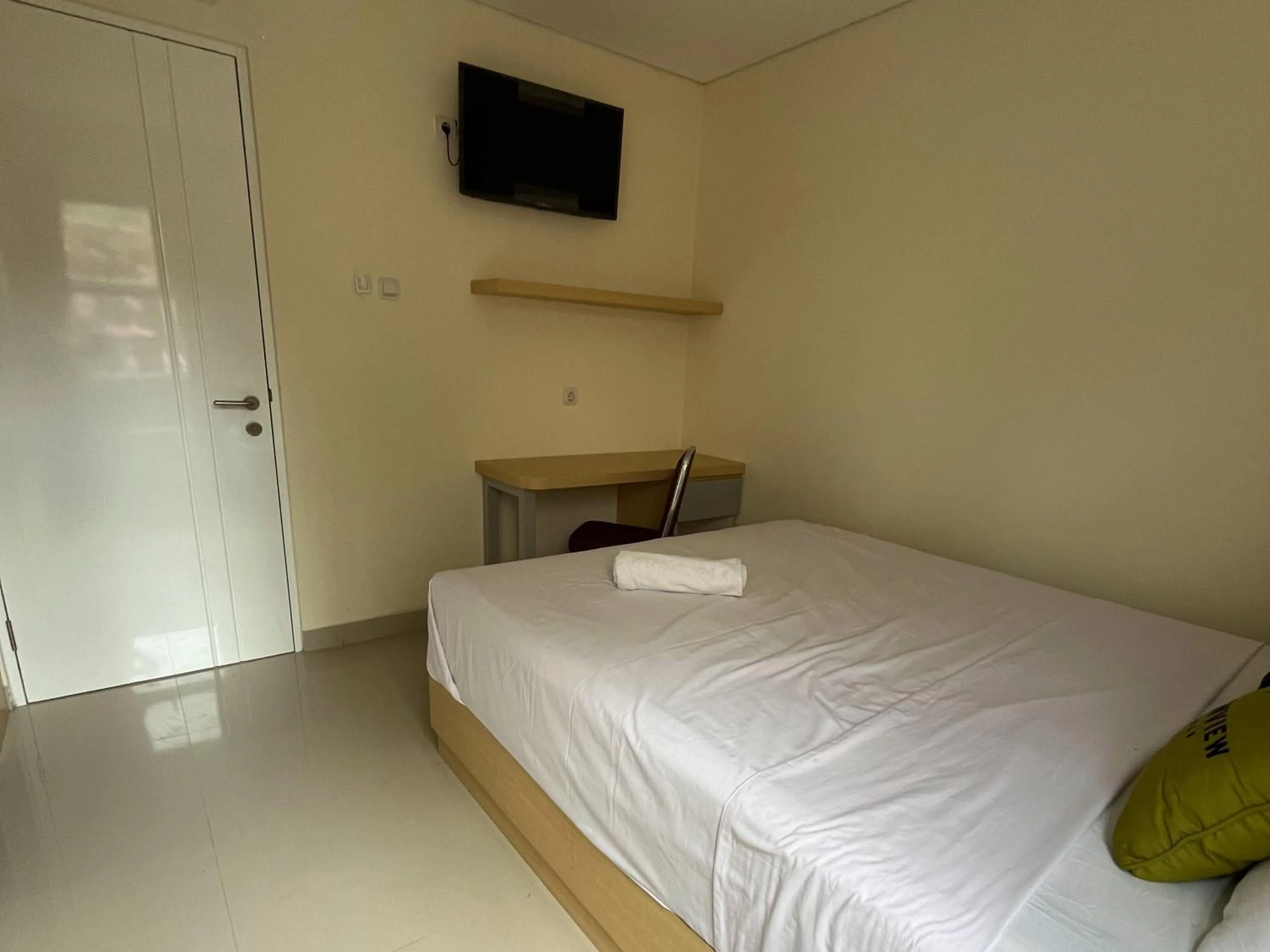 Bedroom, Bed in Urbanview Indria Inn Solo by RedDoorz