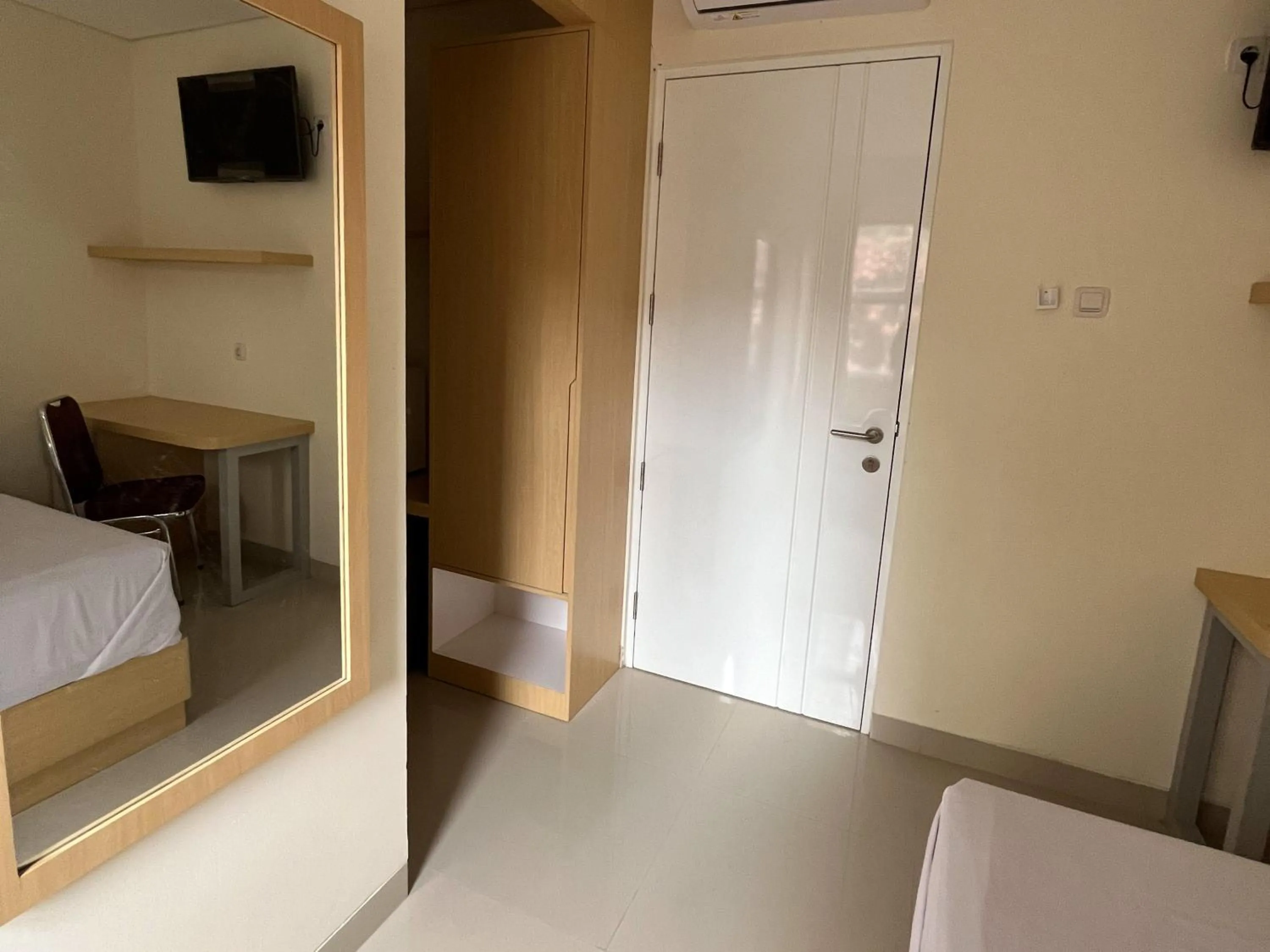 Bedroom, Bed in Urbanview Indria Inn Solo by RedDoorz