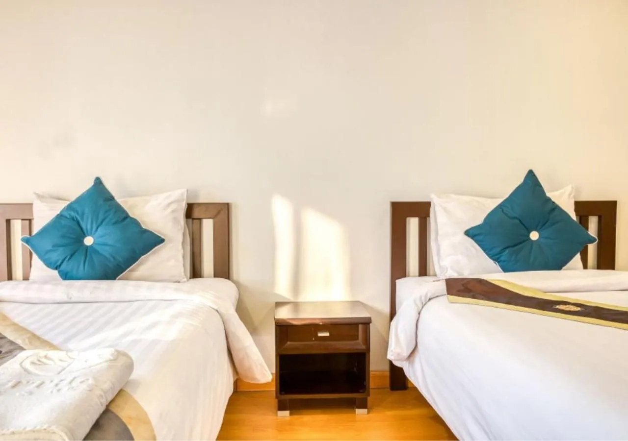 Bed in Kiatthada Resort