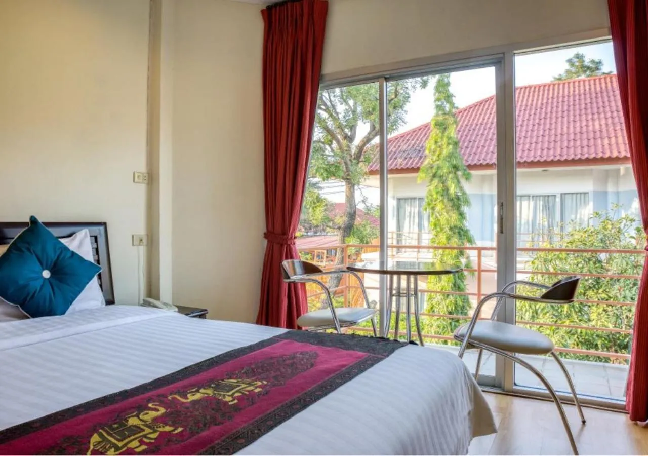 Bed in Kiatthada Resort