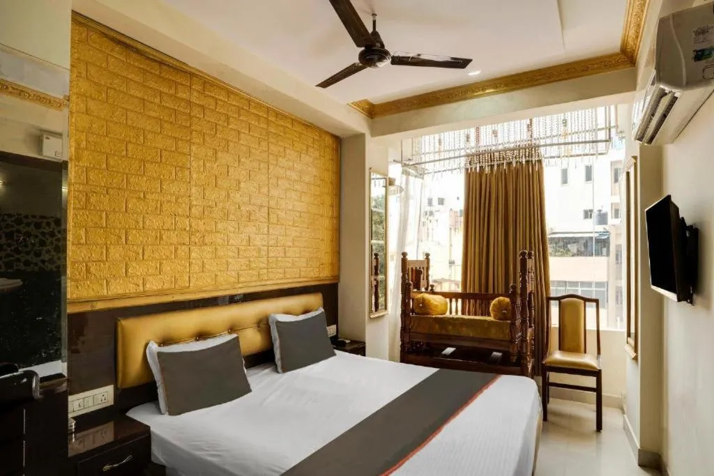 Bed in Ya Inn Rooms & Suites