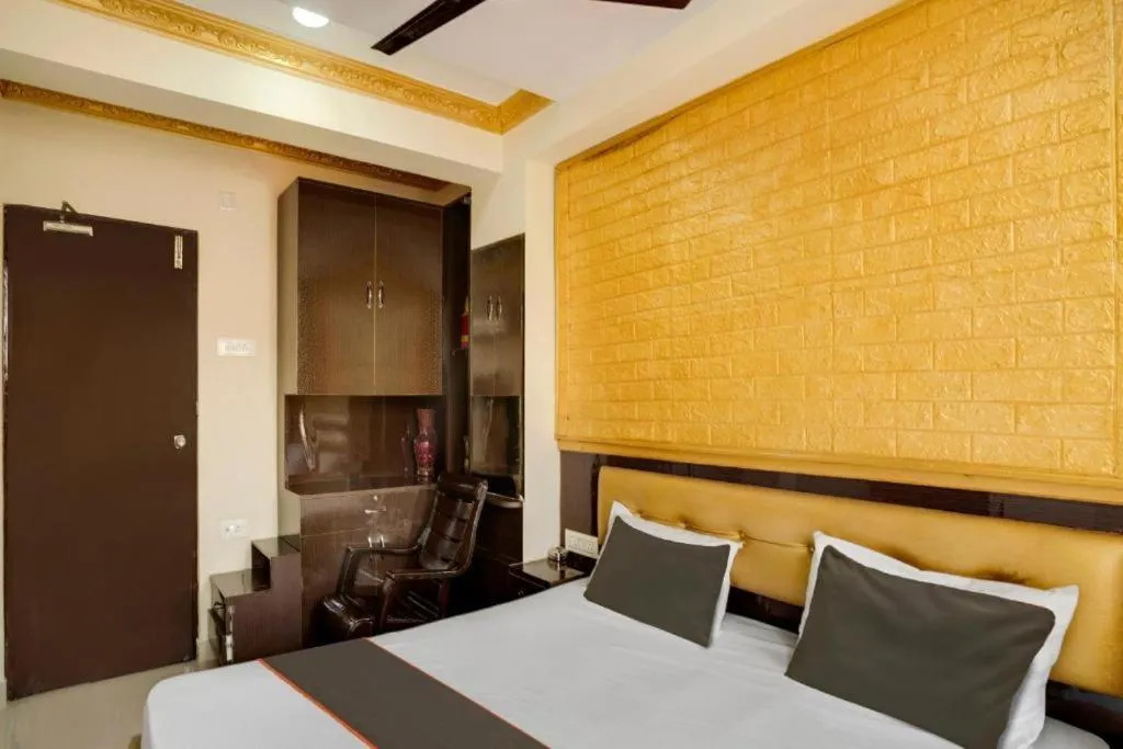 Bed in Ya Inn Rooms & Suites