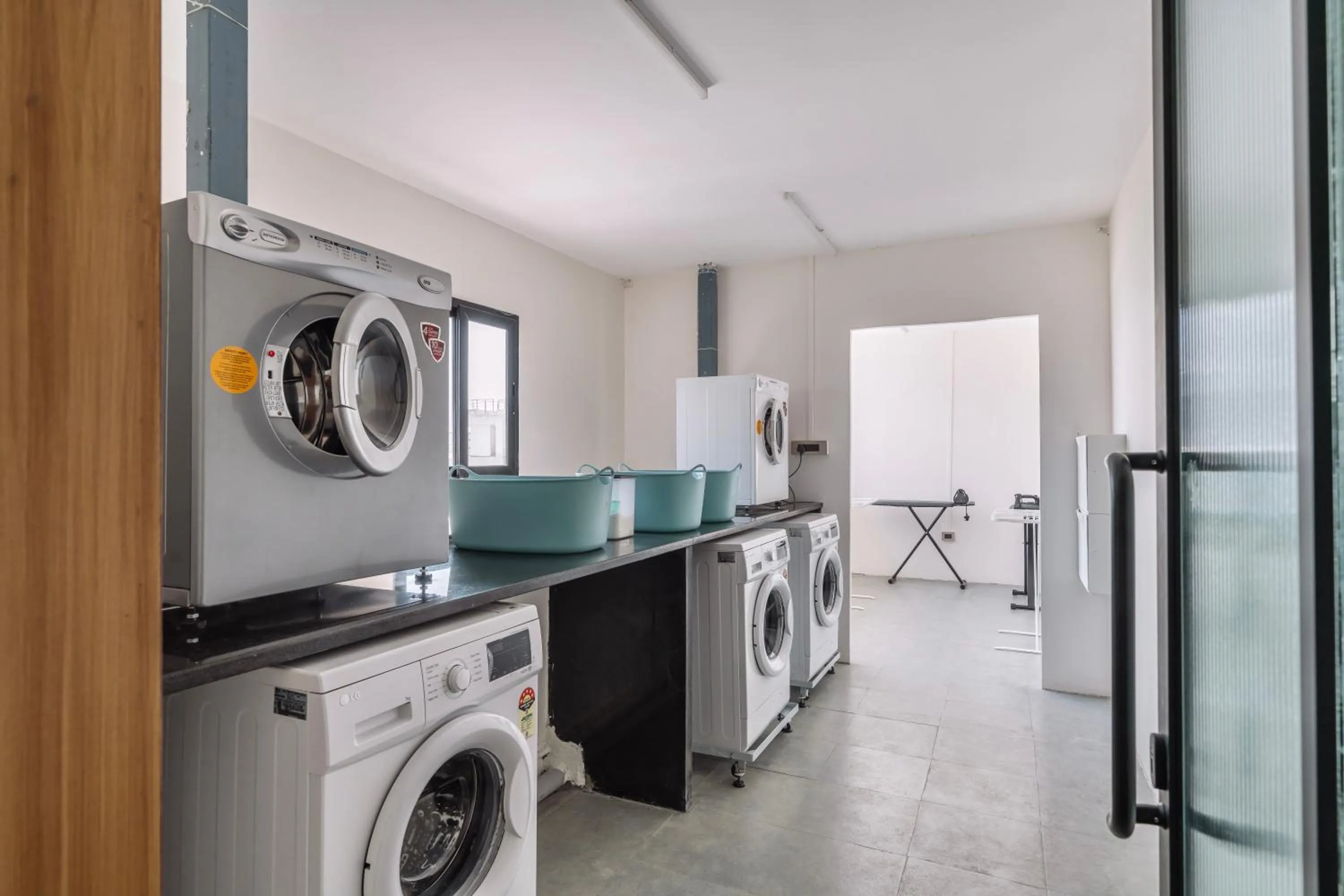 washing machine in SKYLA Studios & Suites - Kondapur