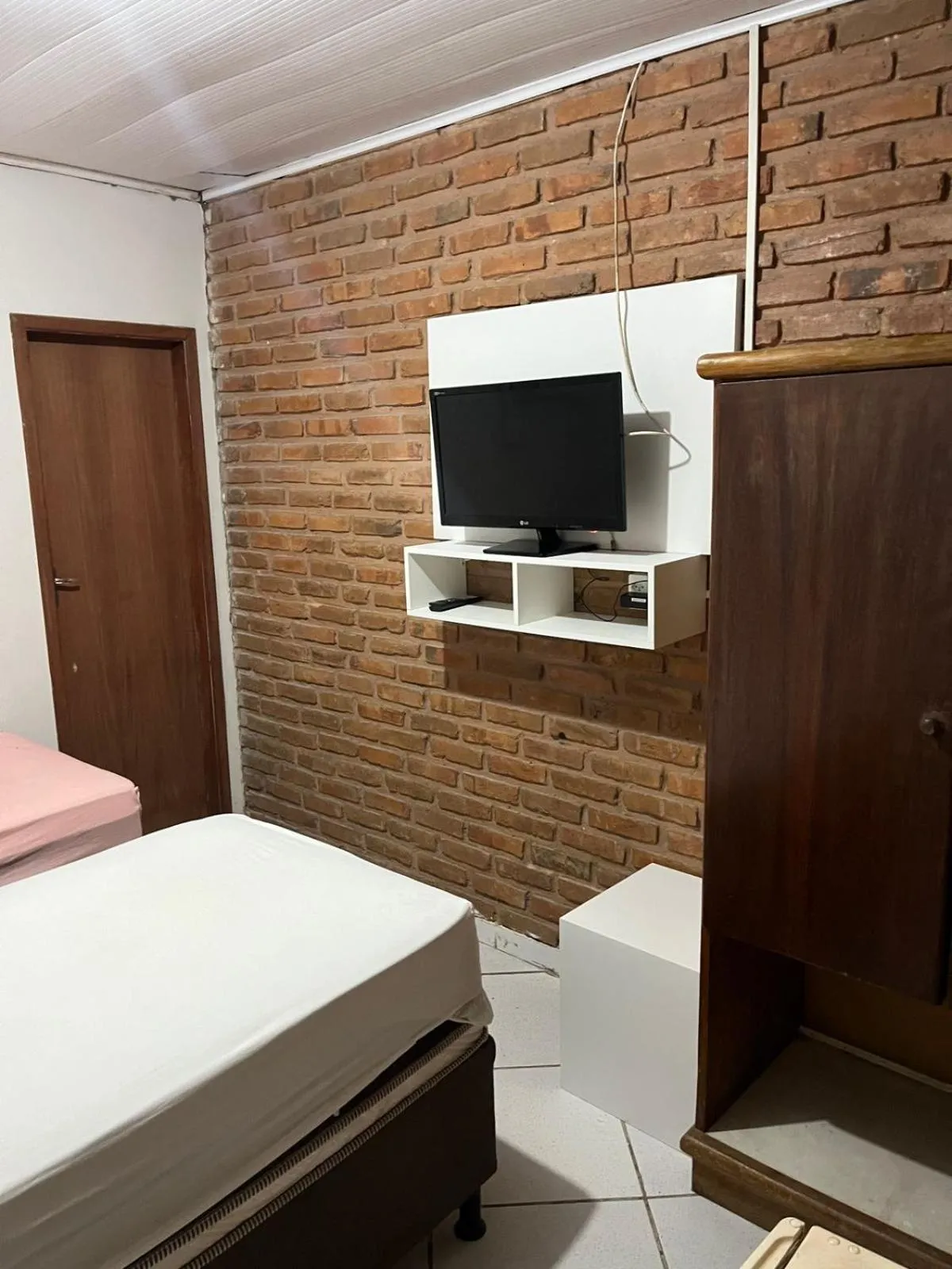 Bed in Pousada Água Viva