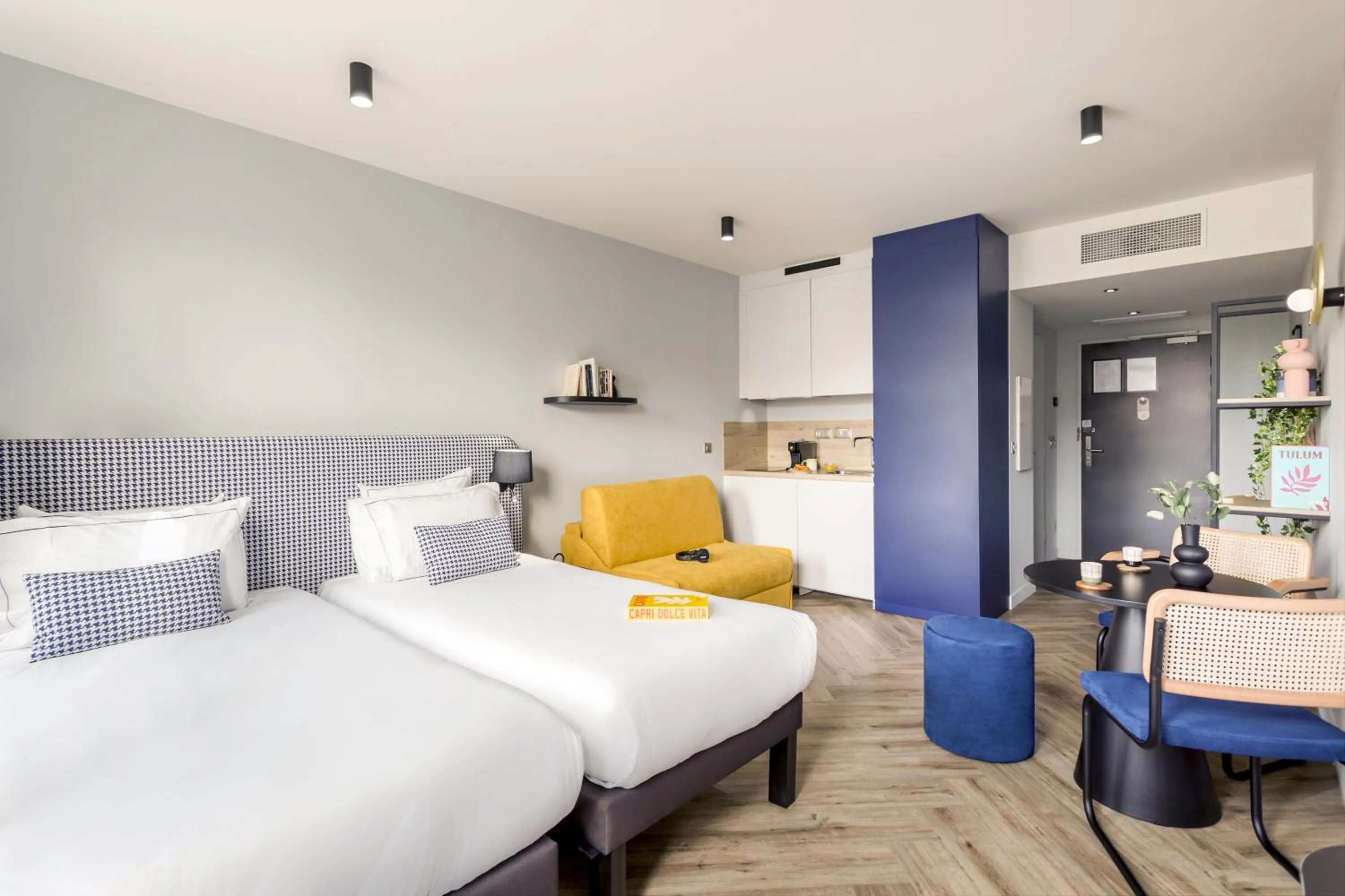 Bed in Appart'City Collection Paris Roissy CDG Airport