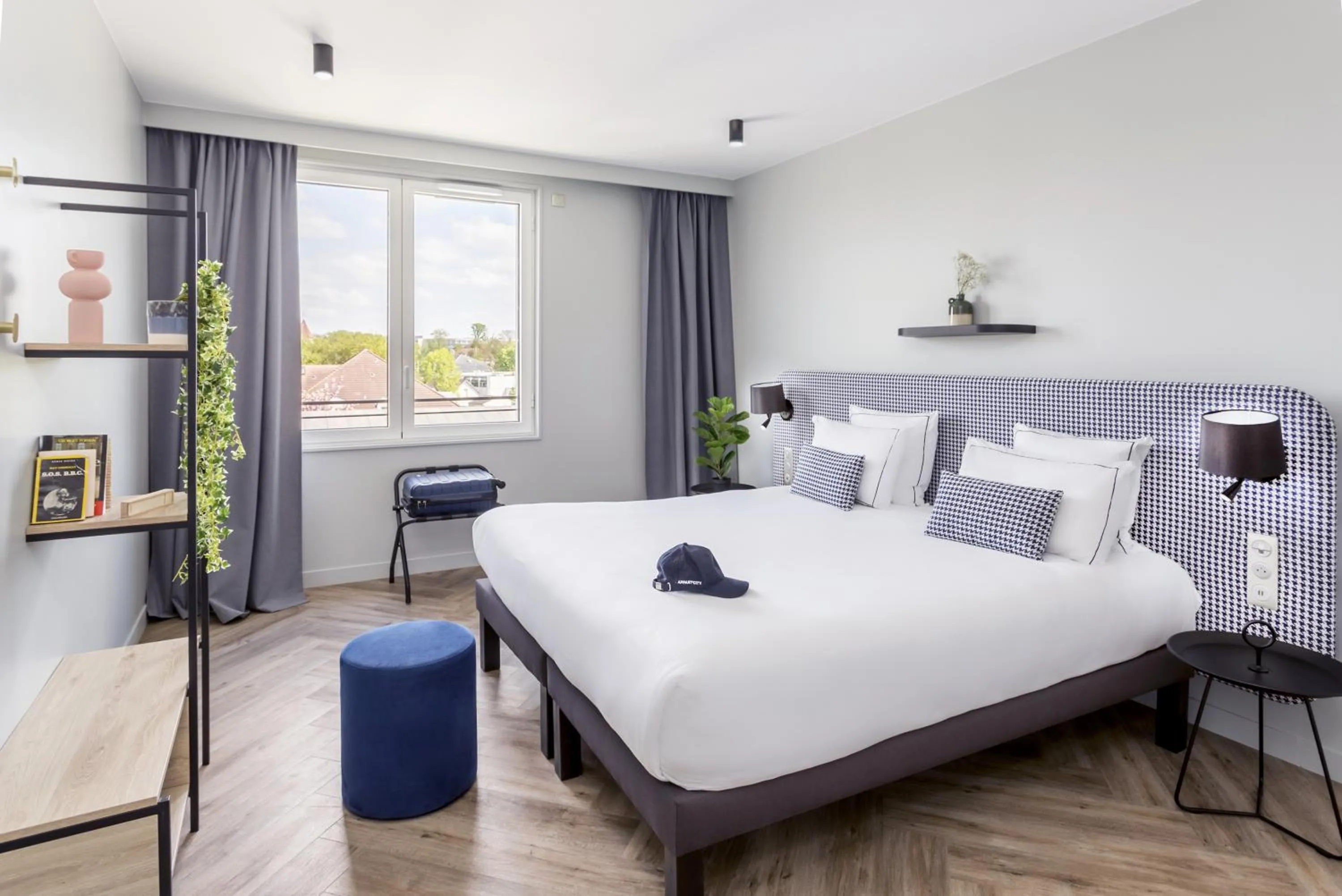 Bed in Appart'City Collection Paris Roissy CDG Airport