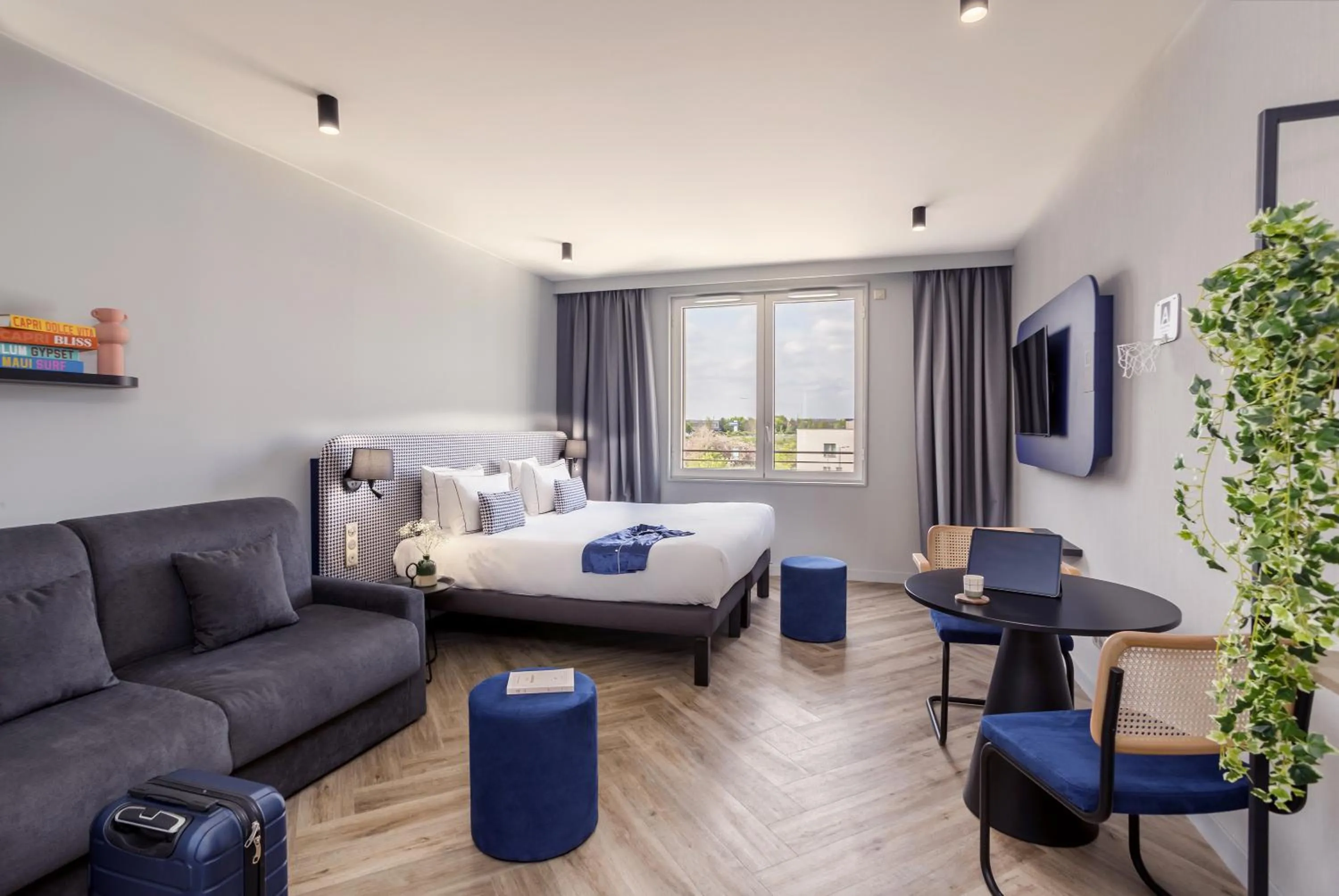 Bed in Appart'City Collection Paris Roissy CDG Airport