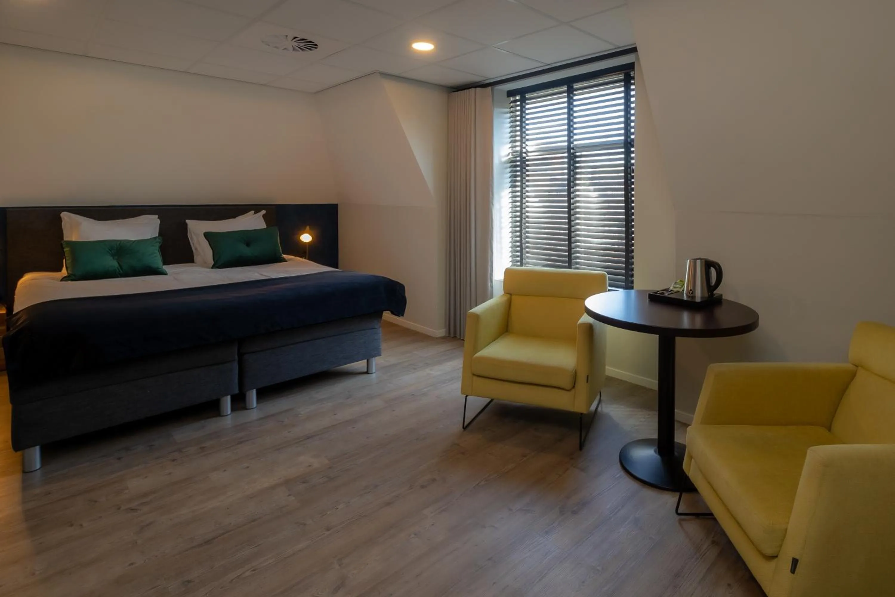 Bed in City Hotel de Jonge