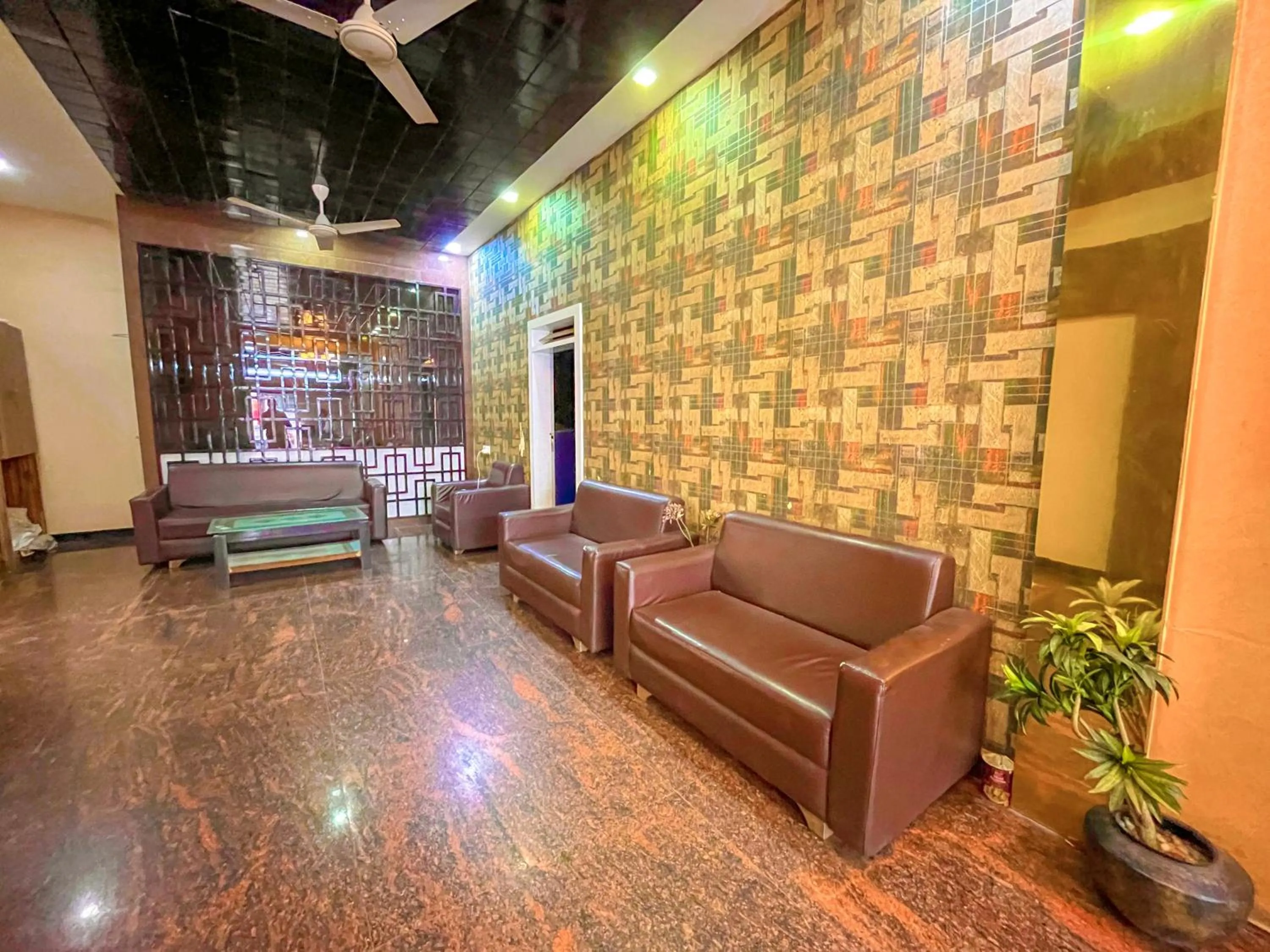 Seating area in StayGuru Park View Residency