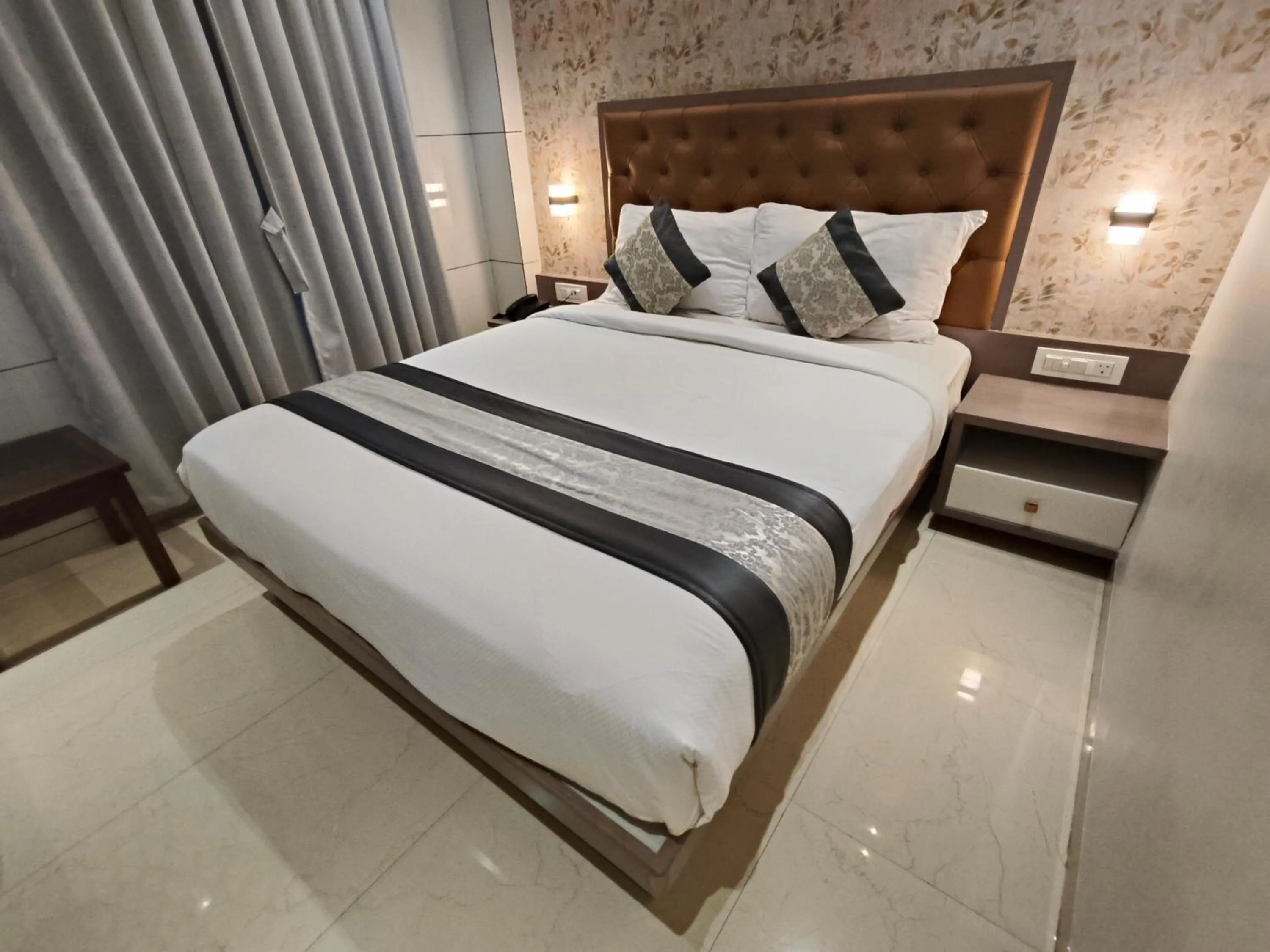 Photo of the whole room, Bed in Hotel Pearl Residency Thane