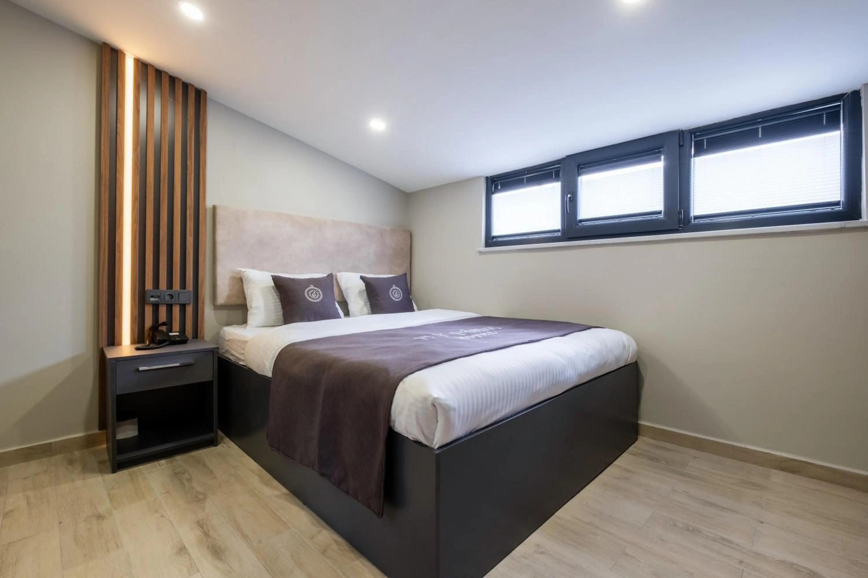 Bed in FLY POINT AIRPORT HOTEL