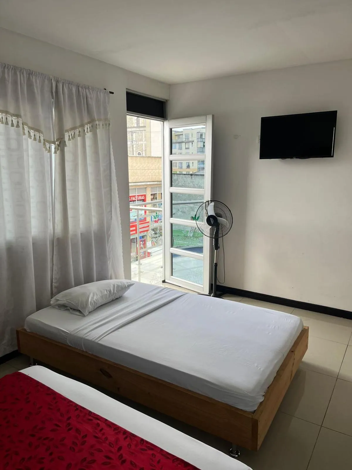 Photo of the whole room, Bed in Hotel El Jardín Cafetero Armenia