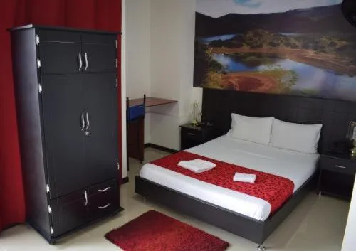 wardrobe, Bed in Hotel El Jardín Cafetero Armenia