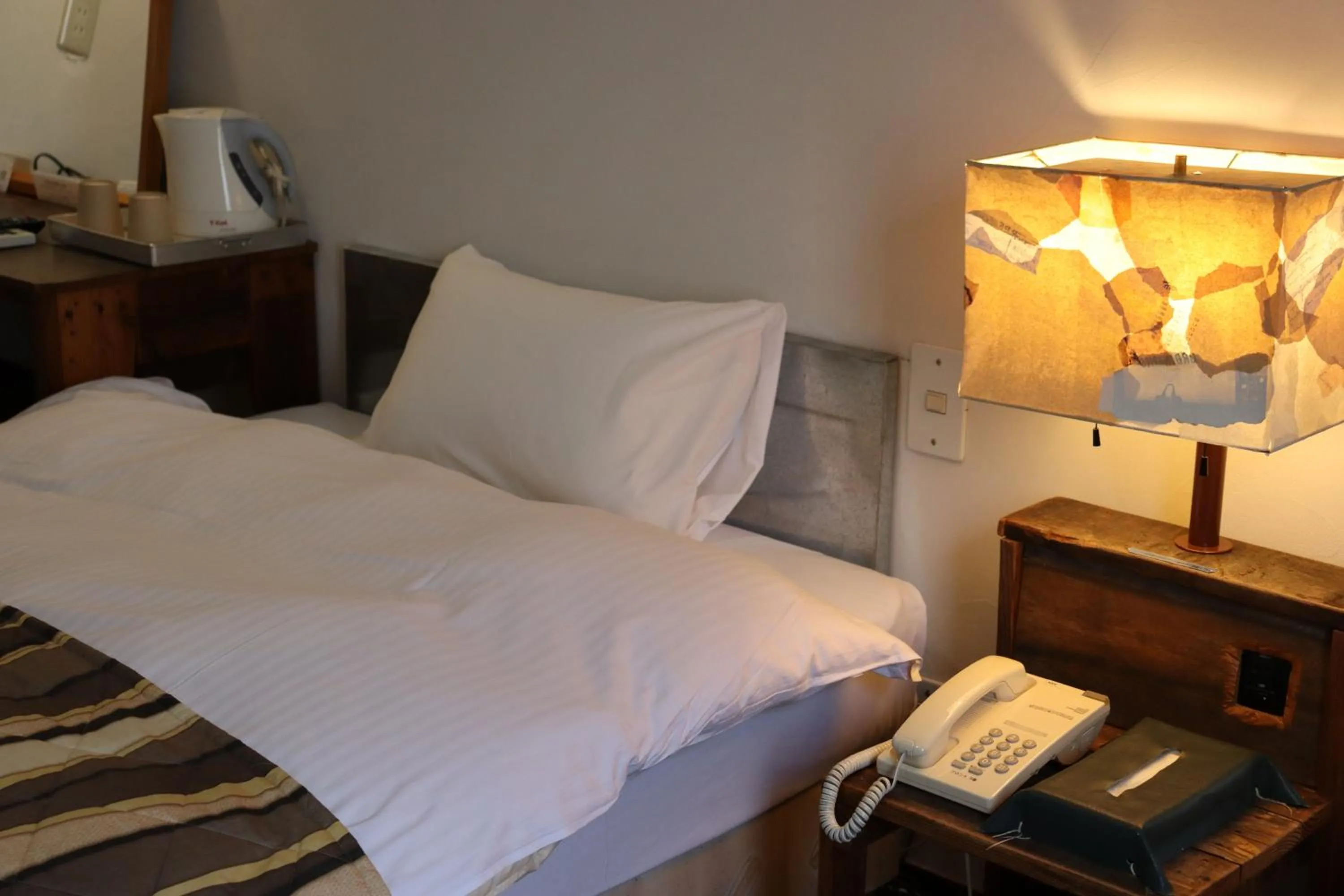 Bed in KULABO Taishokan