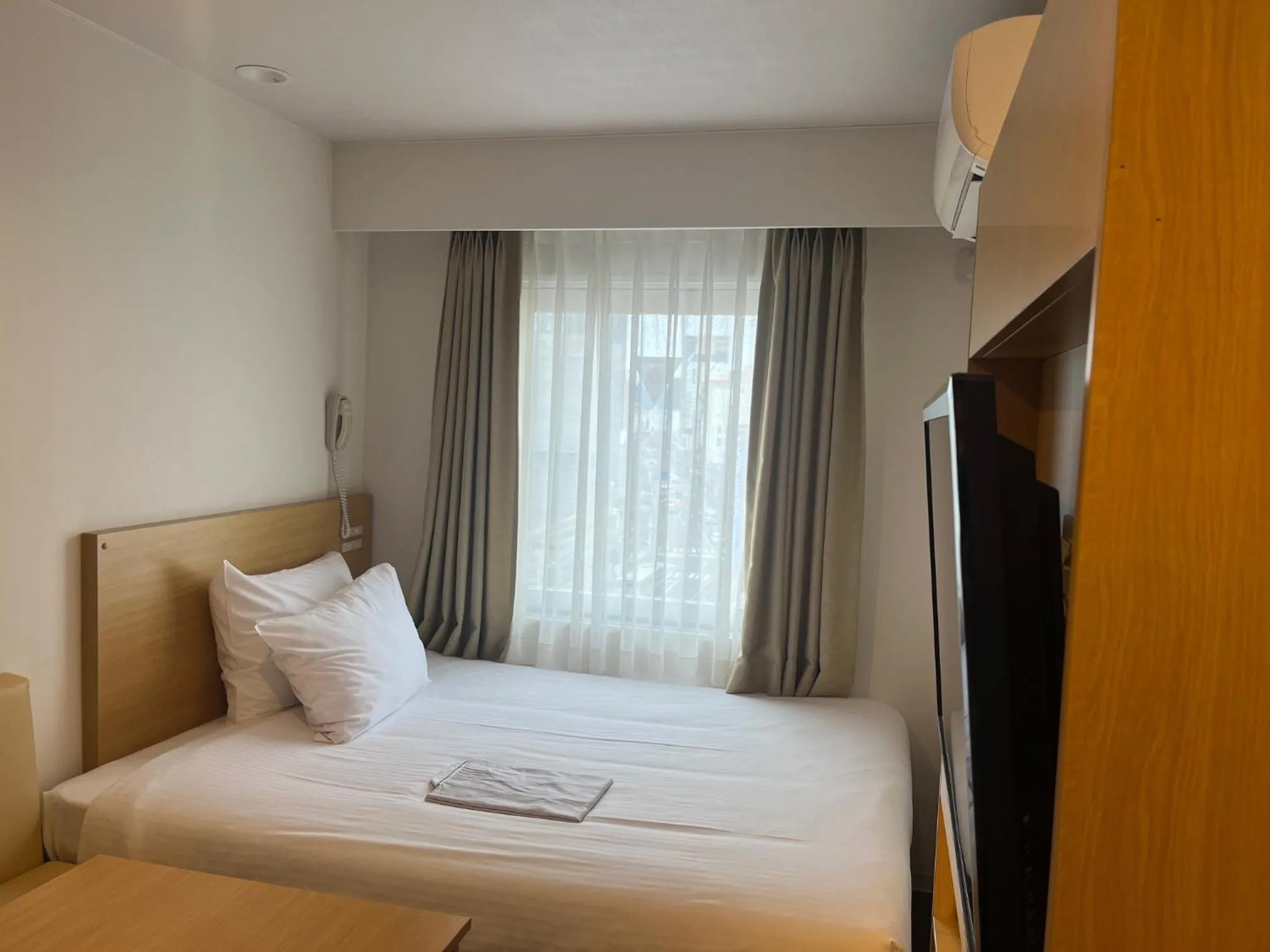 Bed in Rembrandt inn Aomori