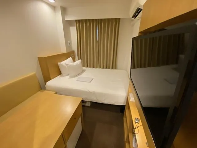 Bed in Rembrandt inn Aomori