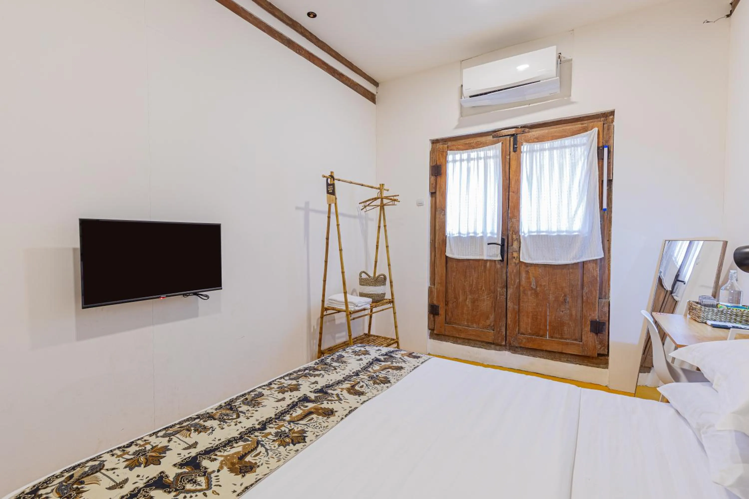 Bed in Yukke Tembi Homestay